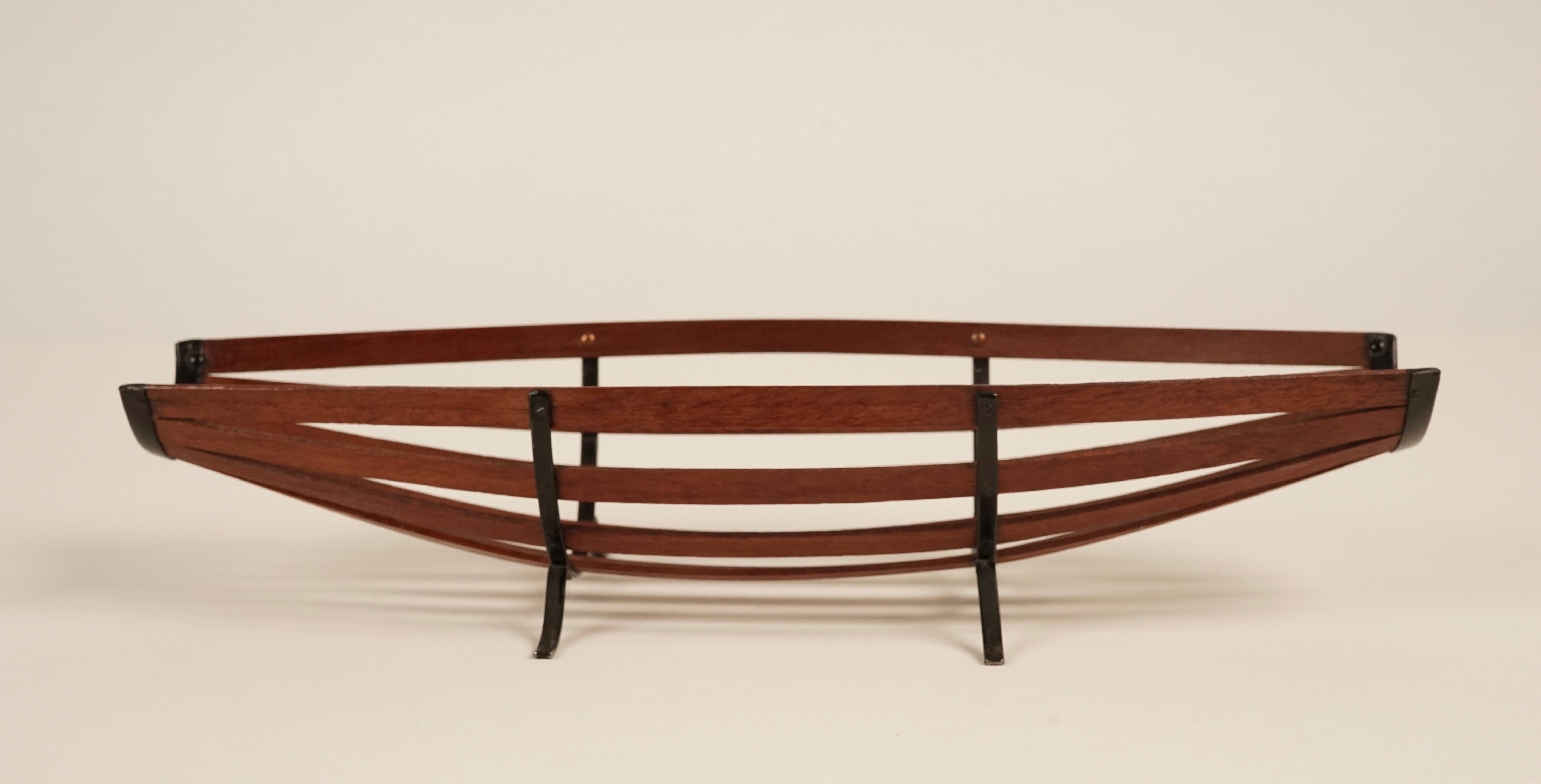 Midcentury teak wood fruit basket from Austria. A simple elegant object with aesthetic qualities similar to Auböck exhibiting excellent workmanship.