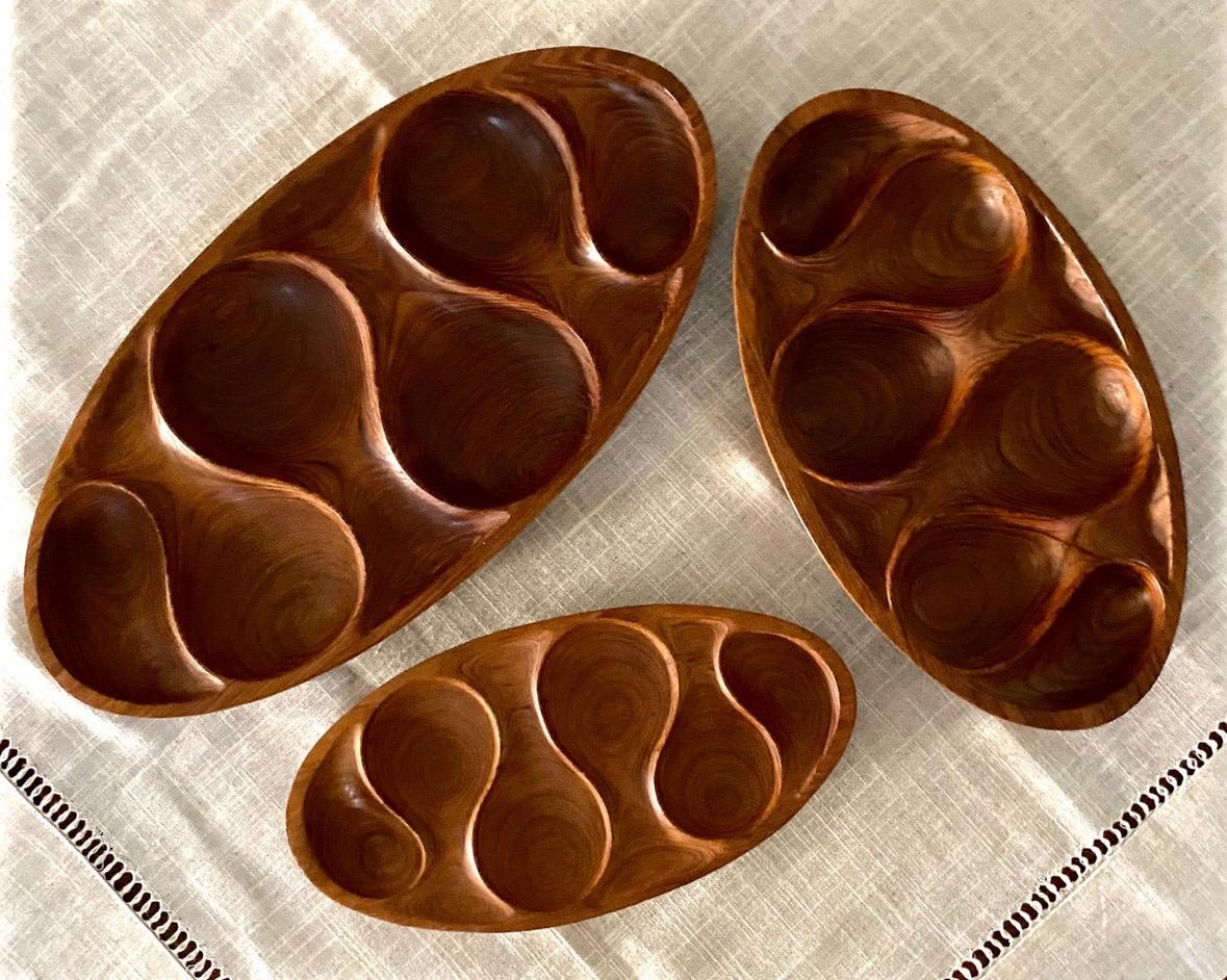 Mid-Century Set of 3 teak trays in different sizes 
Large 8.8”x17.5”x1”
Medium 8”x14”x1”
Small 6”x12”x1”
These are in the Style of Laur Jensen for Odense Denmark (no label )