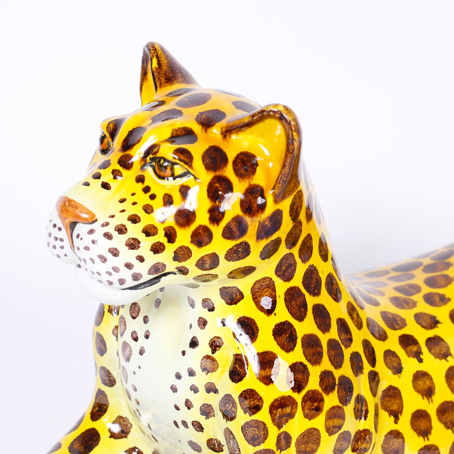 Impressive midcentury Italian leopard sculpture hand decorated, glazed and in repose.