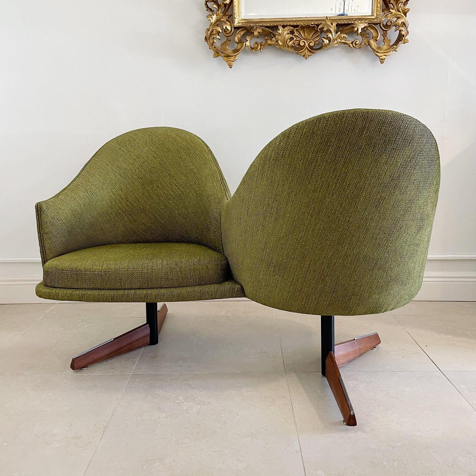 1950's Tete a tete recently upholstered with new foam , fabric and strapping in green Knoll fabric. The base has been powder coated and the wood refinished so fully restored to original like new condition. Maker unknown.