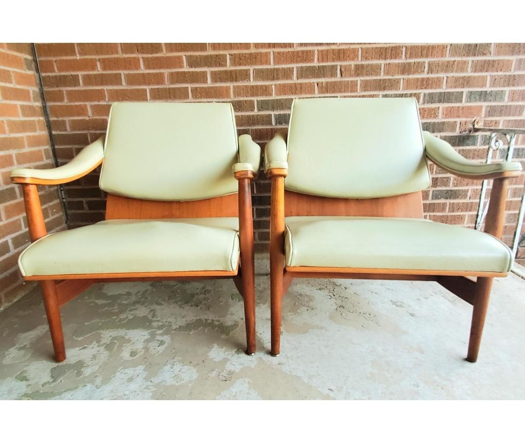 Came out of a government building in Oklahoma City. 
Still labeled.

A fabulous pair of Mid Century/ Danish Modern Chairs by Thonet Industries. They are super heavy and solid chairs--the main base: back and seat are one solid piece of bent plywood.