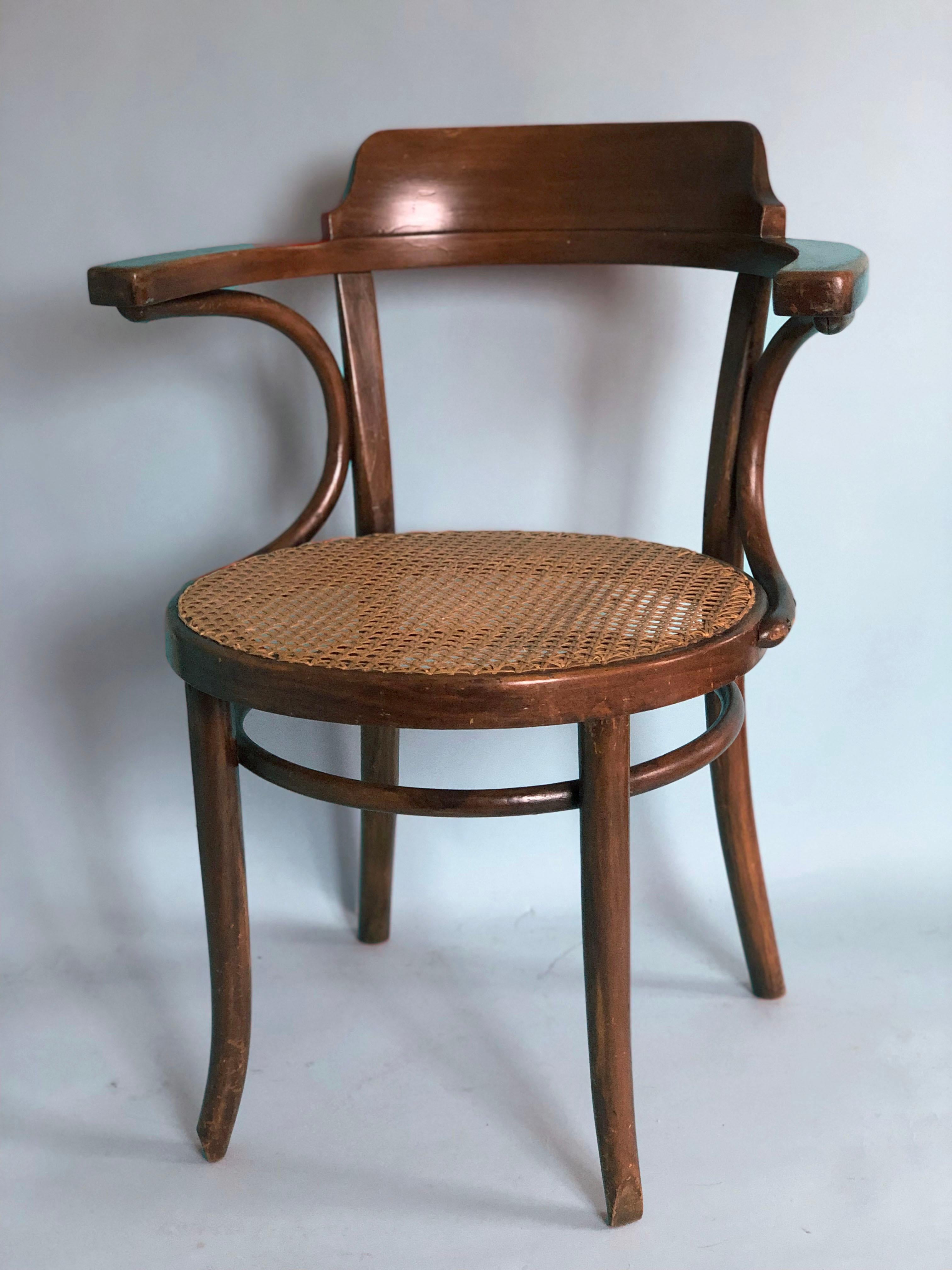 A pair of beautifully shaped bentwood chairs with cane from Thonet. Designed at the end of the 19th century. These 2 chairs were produced in the 1950s in the Thonet factory 