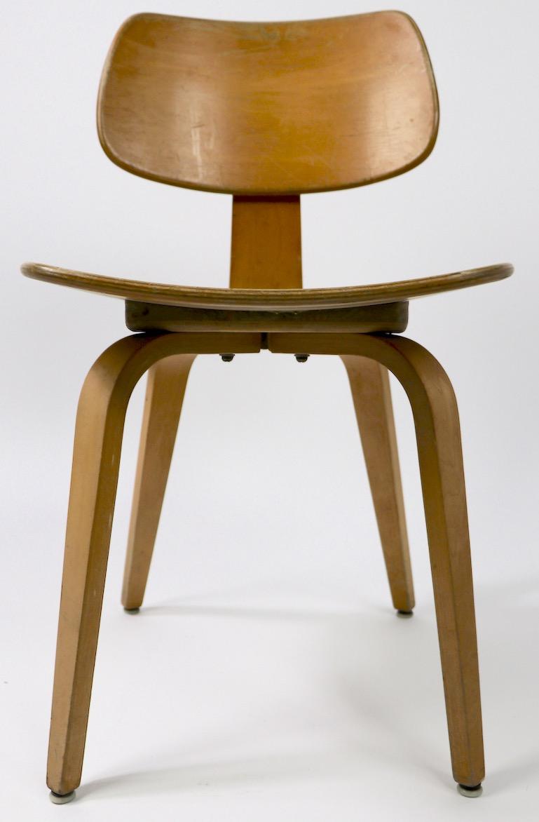 Stylish bentwood dining chair by Thonet. This example is structurally sound, and sturdy, it shows significant cosmetic wear to the finish. Usable as is, or can be refinished if you want a more polished look. Originally designed as a dining chair, it