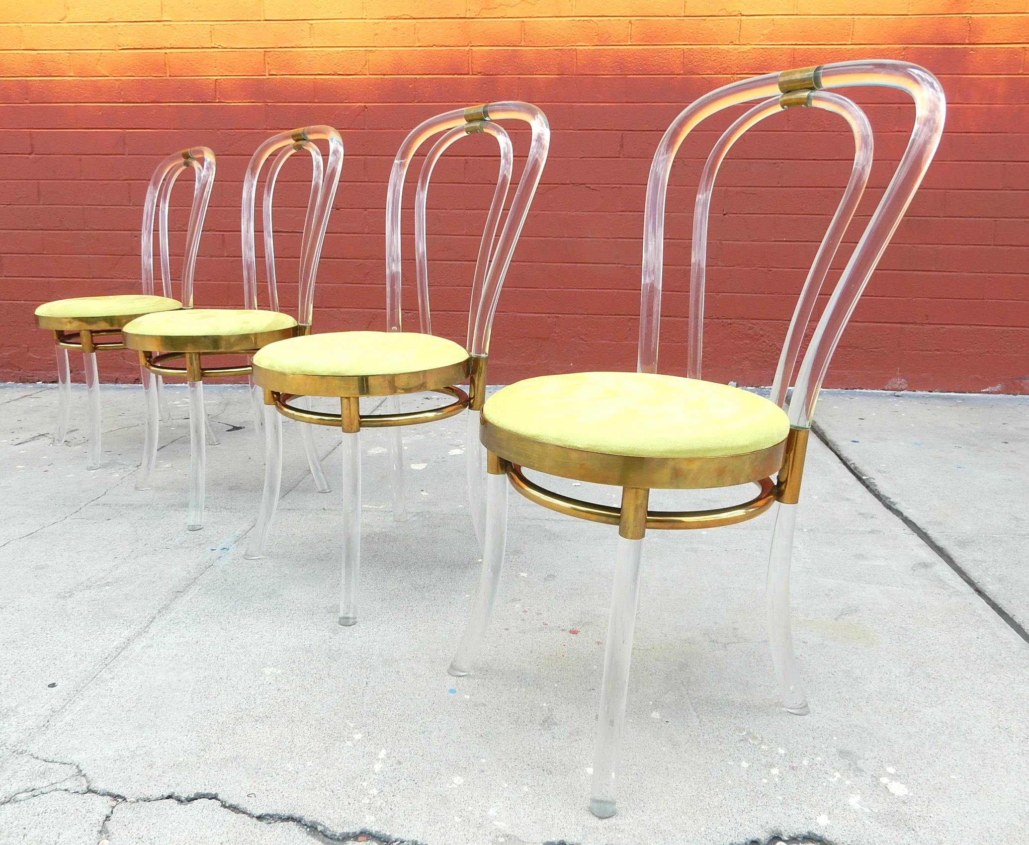 Magnificent set of the iconic Thonet Number 18 bentwood style chairs with a midcentury twist.
They are sculpted of thick Lucite rods joined to a solid brass seating area and upholstered in
lime green ultra suede,
circa 1970s, these are custom one