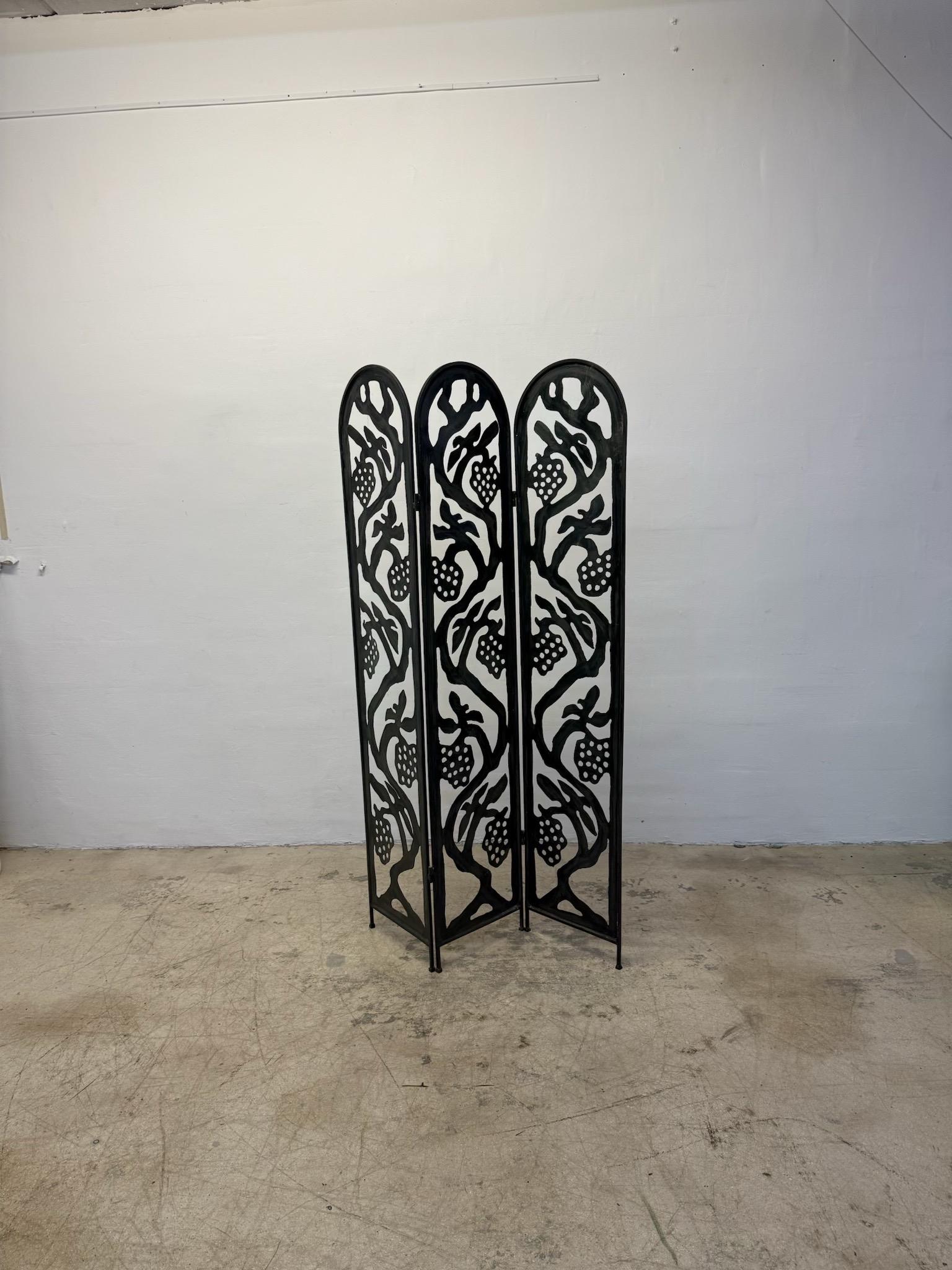 Faux patinated bronze finished metal three panel screen or room divider.