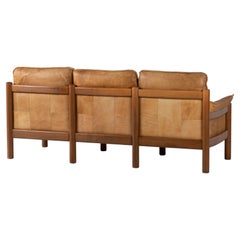 Dreisitziges Ledersofa aus der Mitte des Jahrhunderts in der Art von Pierre Chapo