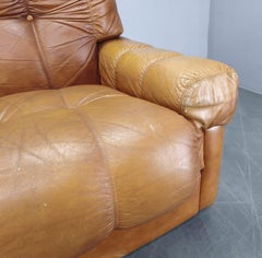 Mid-century three-seat sofa produced in Italy during the 1970s.