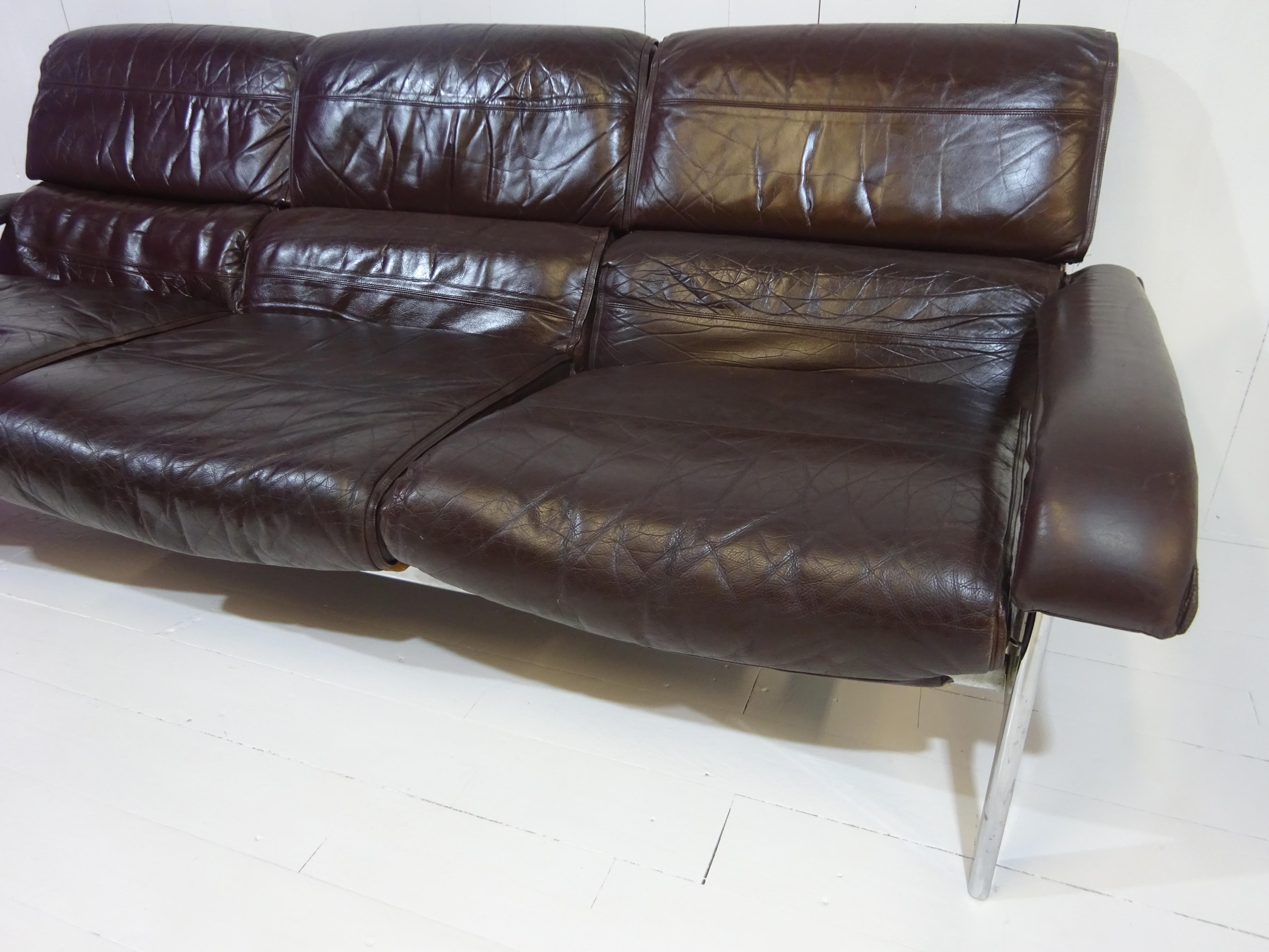 distressed tan leather sofa