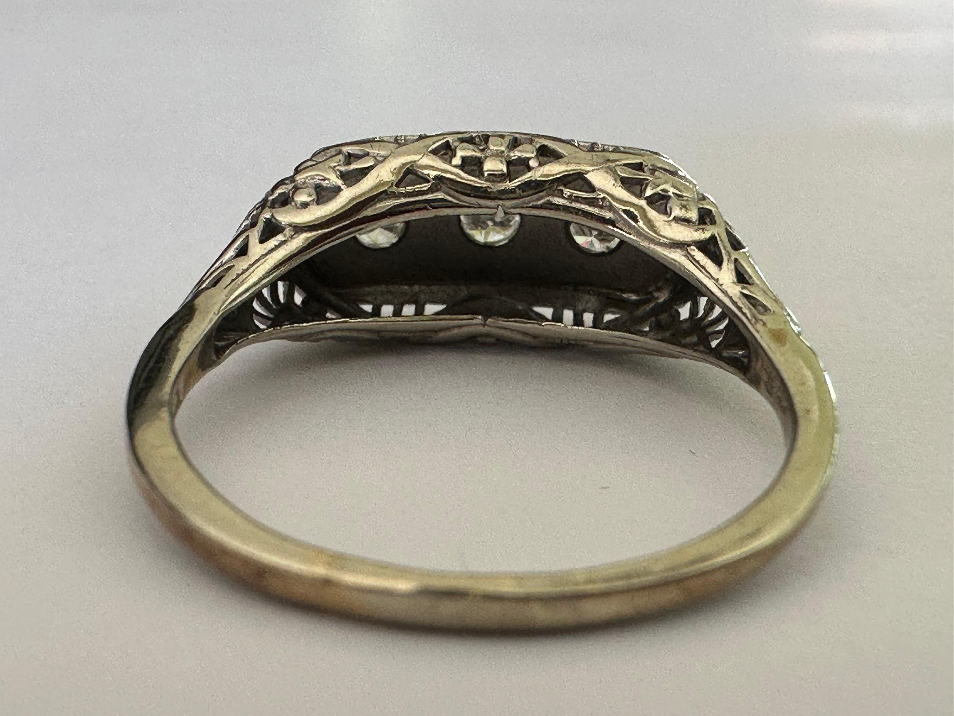 Brilliant Cut Mid-Century Three-Stone Diamond and Filigree Ring For Sale