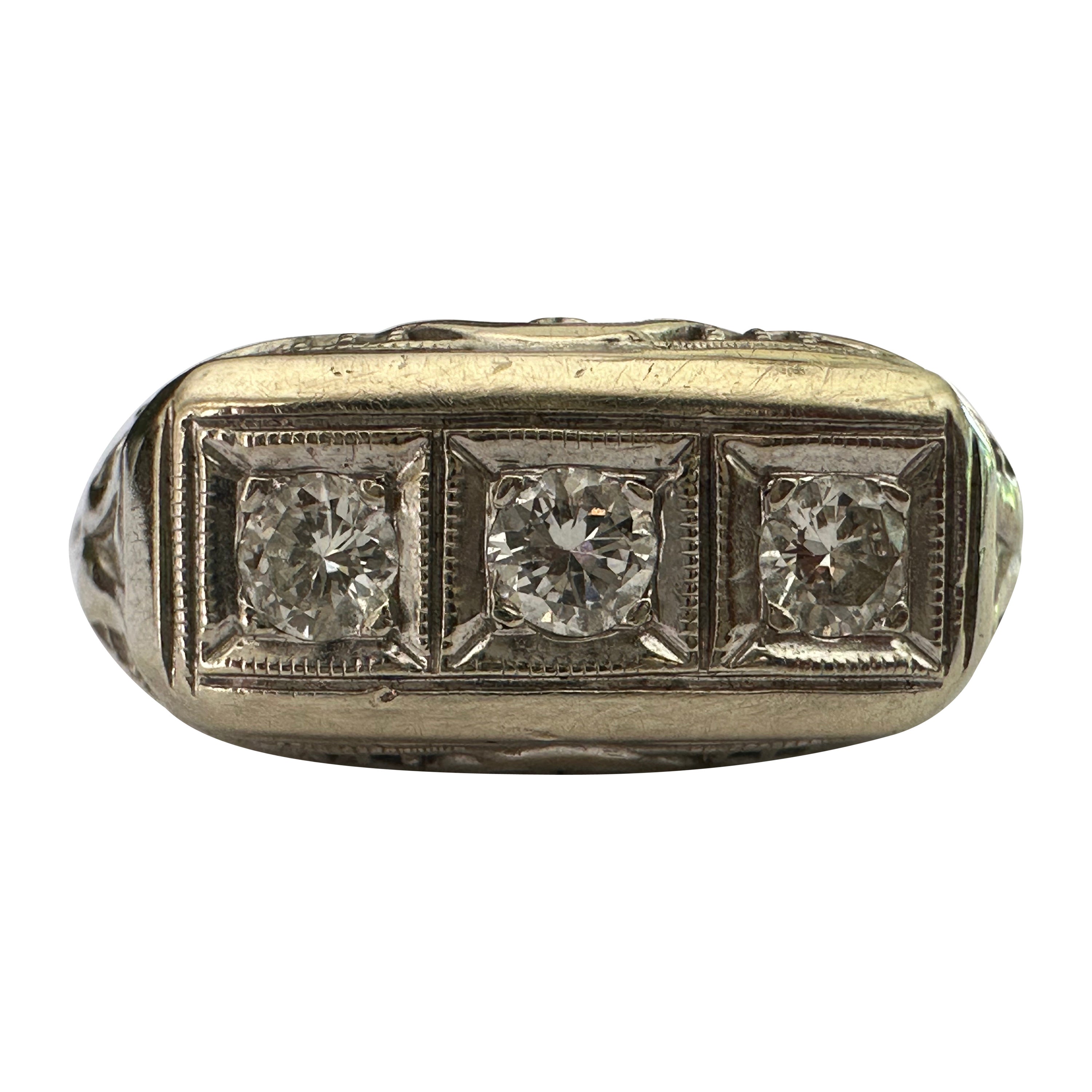 Anillo de filigrana y diamantes de tres piedras de mediados de siglo