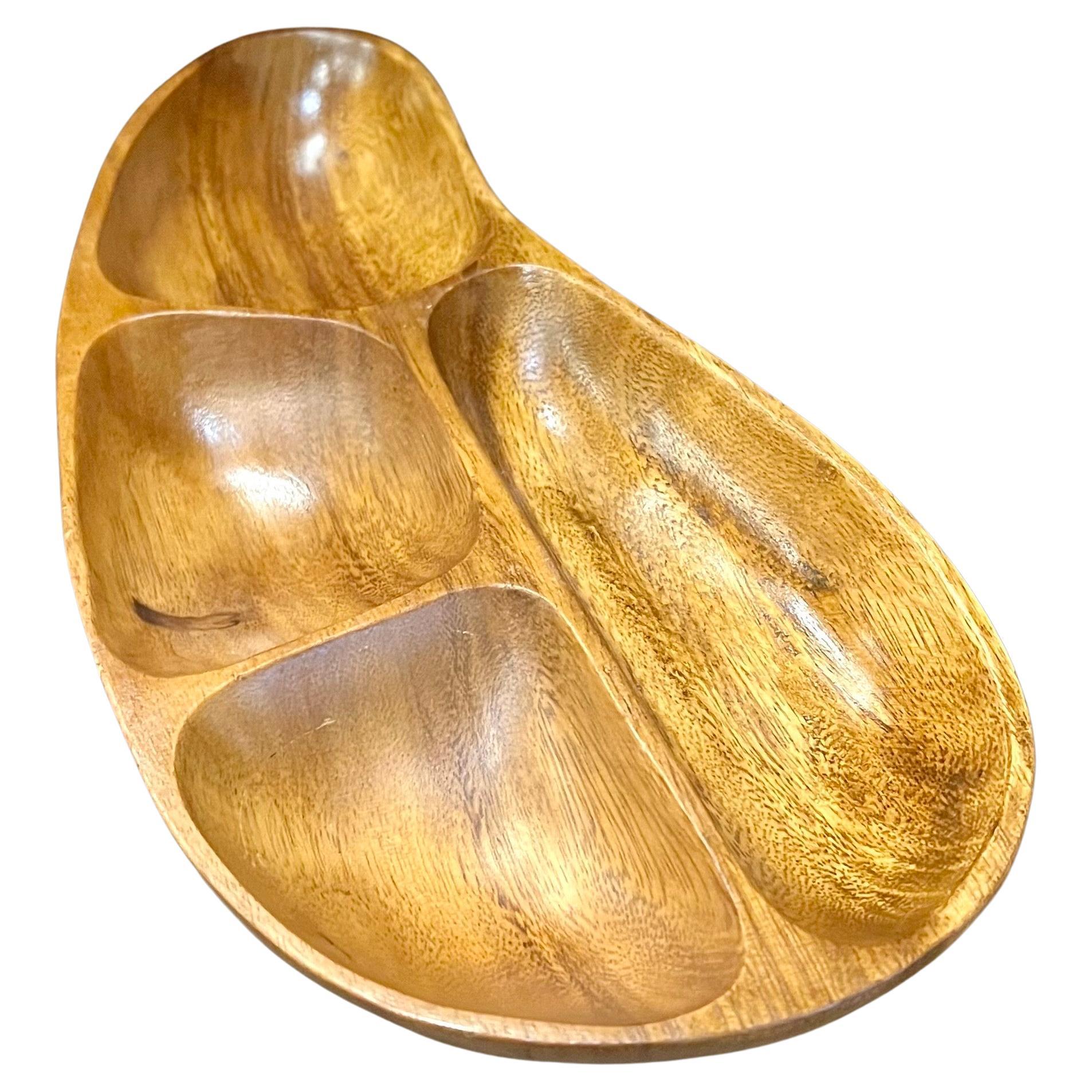 Beautiful shape and condition on this freeform snack Catch it all bowl, circa 1960's hand crafted in the Philipines.