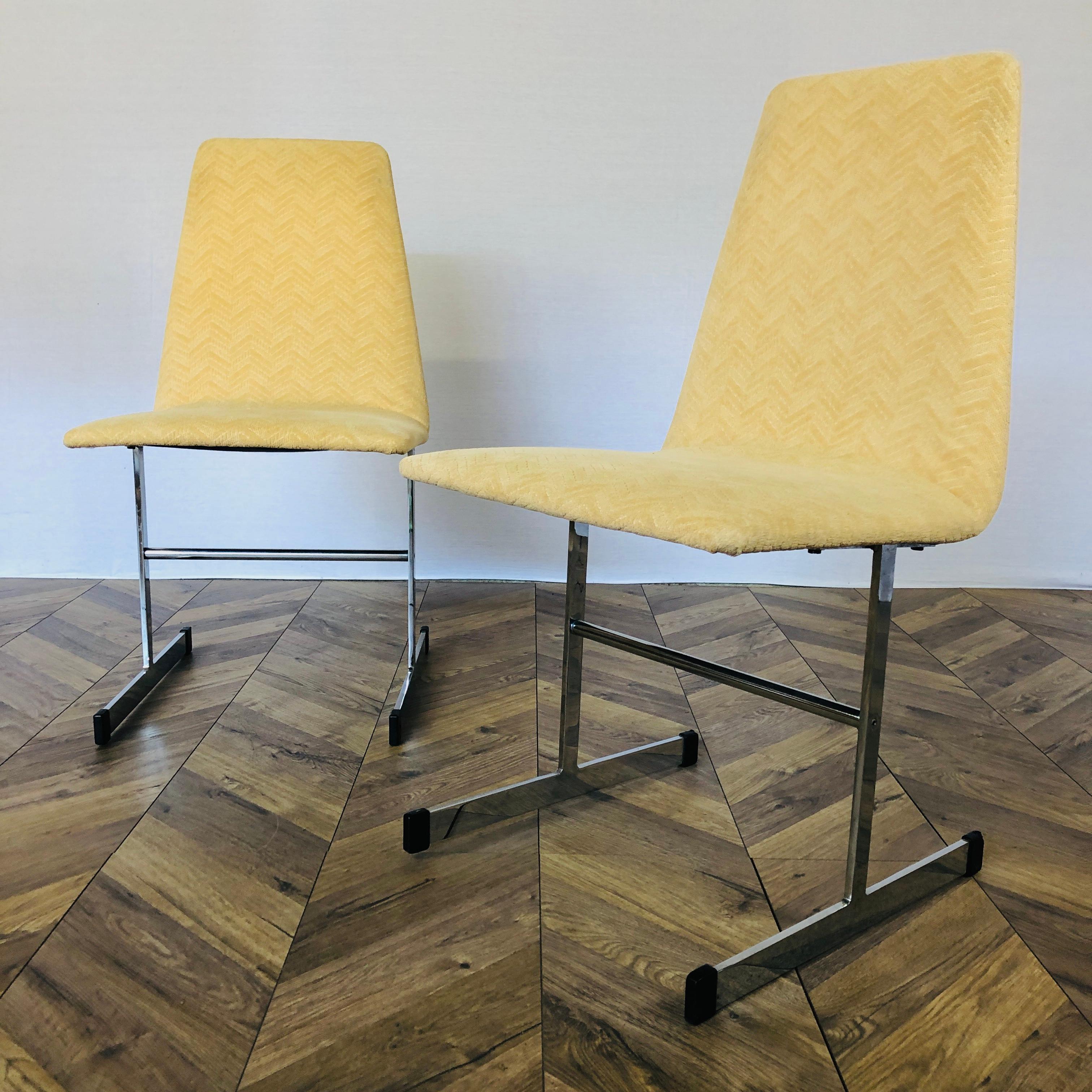 Set of 2, Vintage Mid Century Dining Chairs, Designed by Tim Bates for Pieff’s, Iconic Lisse Range. 

The Chairs feature chrome steel frames with single form seat and backrest set on chromed steel sleigh legs. The upholstery, which is original, is