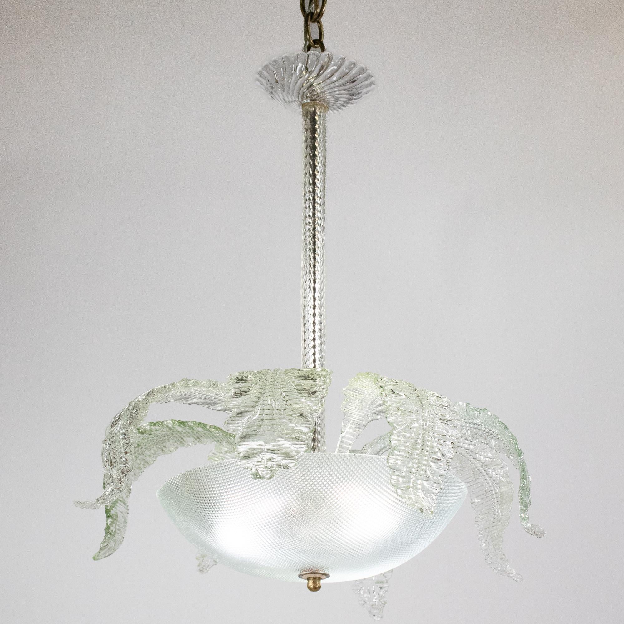 This delicately handcrafted mid-century Murano light fixture is adorned with beautiful leaves in the style of Barovier & Toso. The glasshouses on the island of Murano are famous for highly ornamented glass chandeliers made of pincered and molded