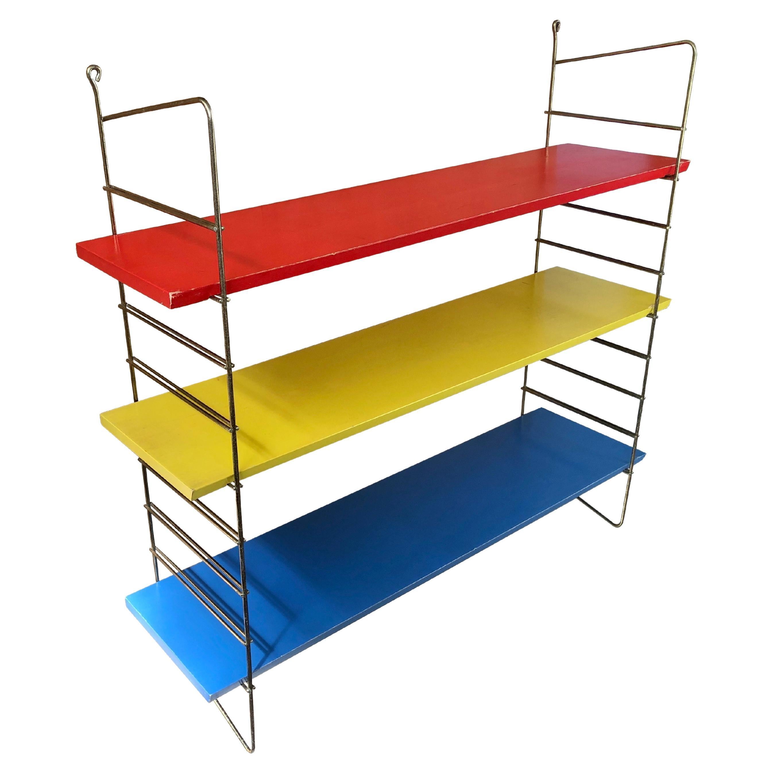 Mid Century Tomado Style Shelf Yellow, Red and Blue Brass Metal String  Sides, 60's For Sale at 1stDibs