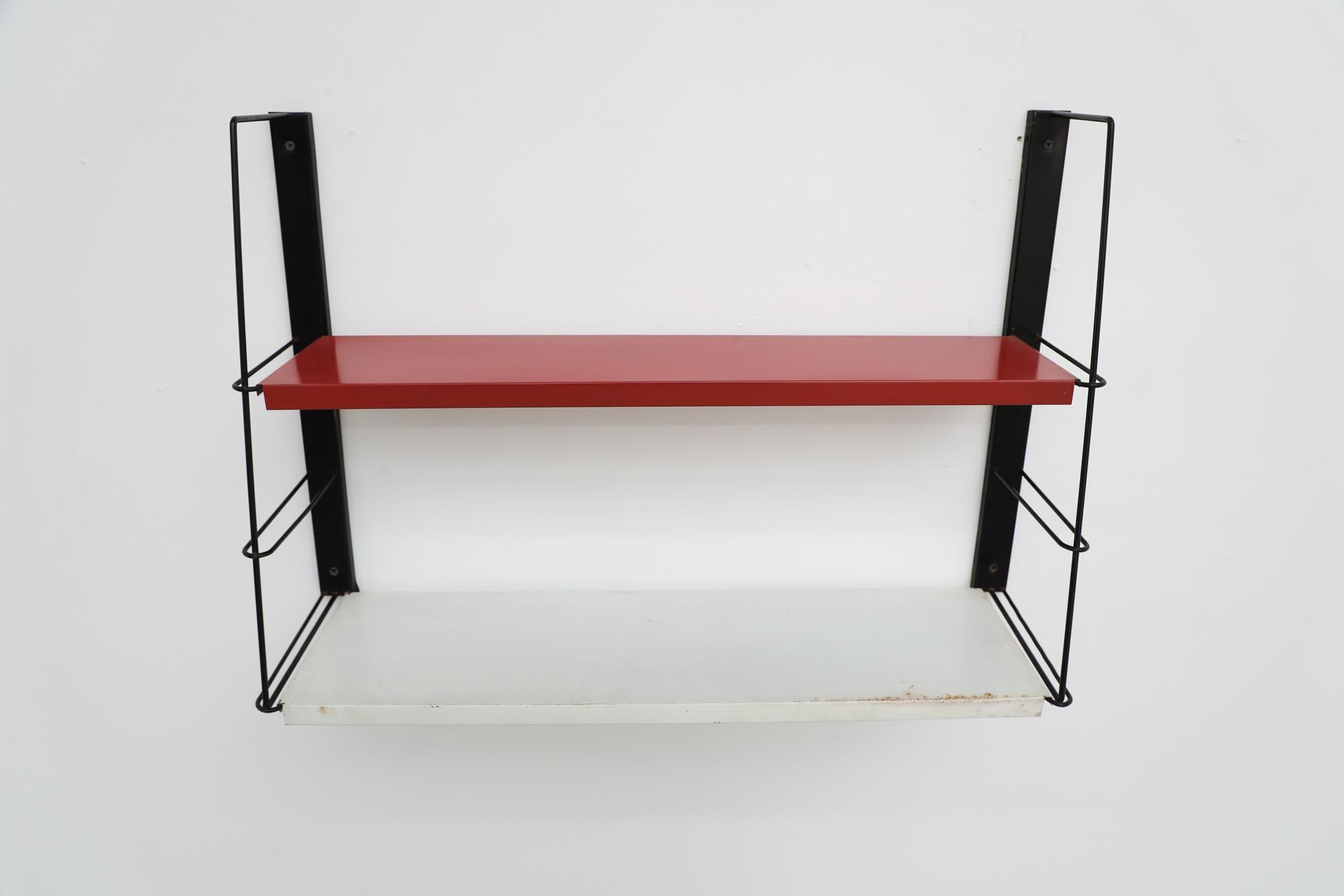 Dutch Mid-Century TOMADO Style Metal Black Framed Wall Shelving w/ Red & White Shelves For Sale