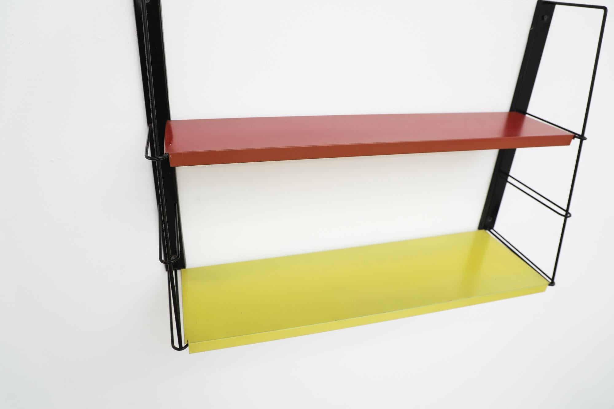 Mid-Century Modern Mid-Century TOMADO Style Slanted Red and Yellow Shelving Unit