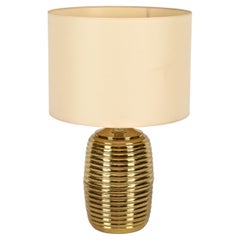Lampe de table Tommaso Barbi du milieu du siècle dernier en laiton avec  Abat-jour beige, Italie, années 1970