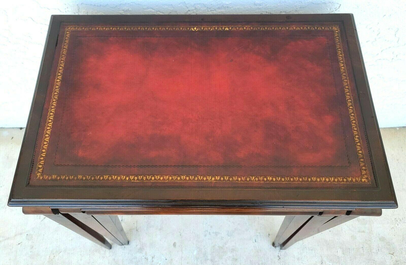 Mid Century Tooled Red Leather Mahogany Nesting Tables In Good Condition For Sale In Lake Worth, FL