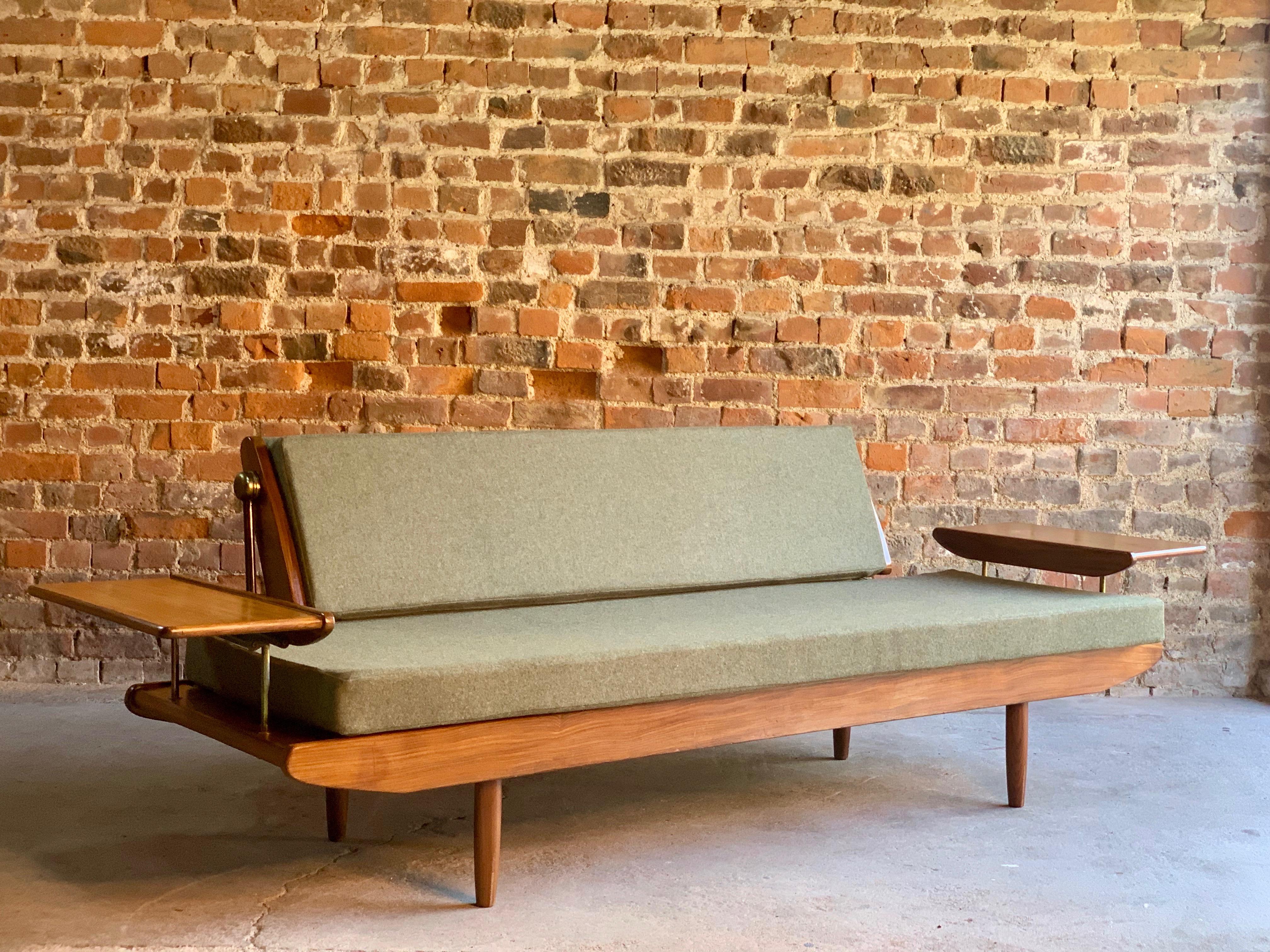 Midcentury Toothill 'Wentworth' Afromosia teak sofa daybed, circa 1960

Magnificent midcentury 'Wentworth' Afromosia teak sofa / daybed by British furniture maker Toothil and sold through Harrods, circa 1960, constructed from solid afromosia teak,