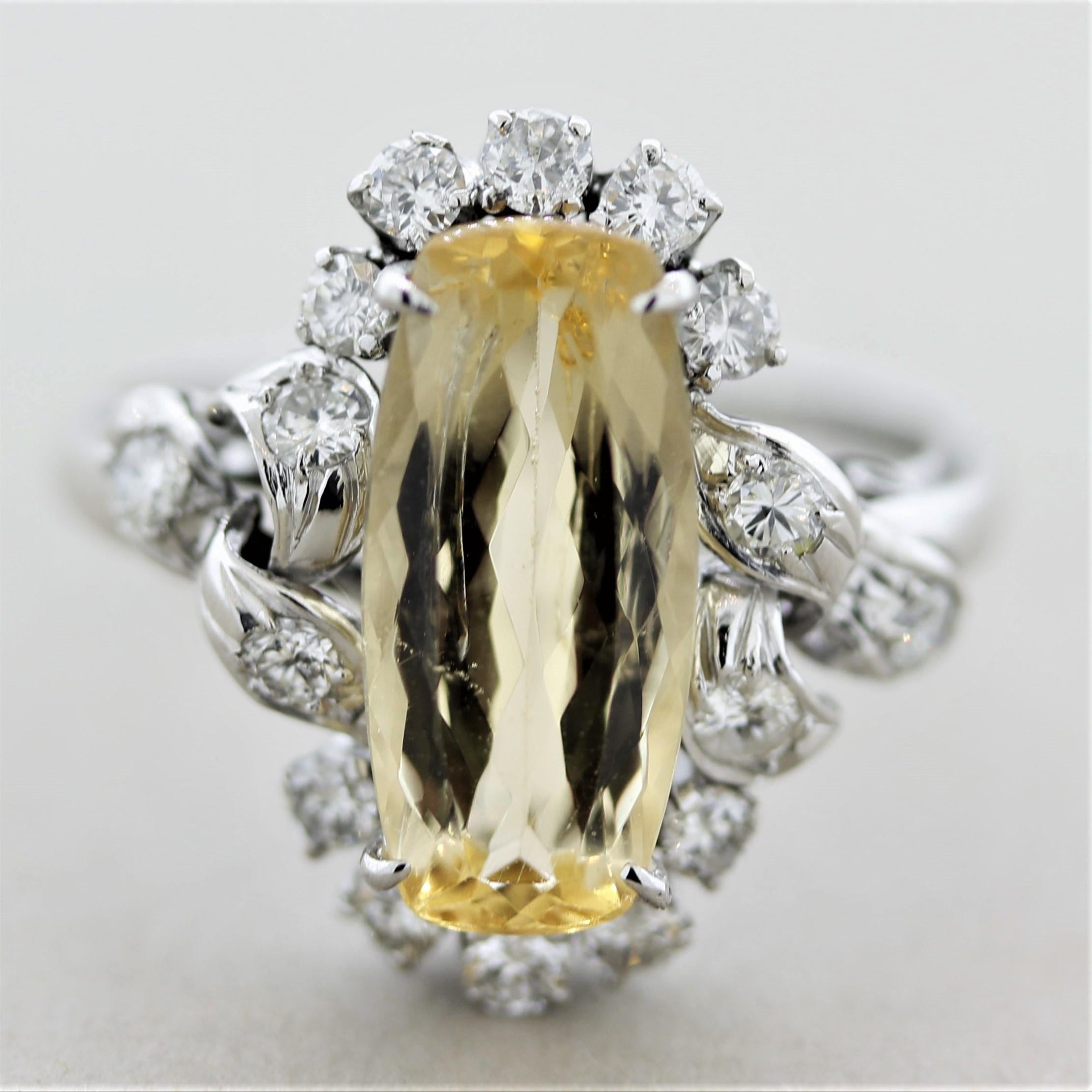 A mid-century treasure, circa 1940's, featuring a 3.38 carat elongated cushion-shaped topaz. It has a bright golden color and is accented by 0.22 carats of diamonds. Hand-fabricated in platinum and ready to be worn. 
Ring Size 6.5