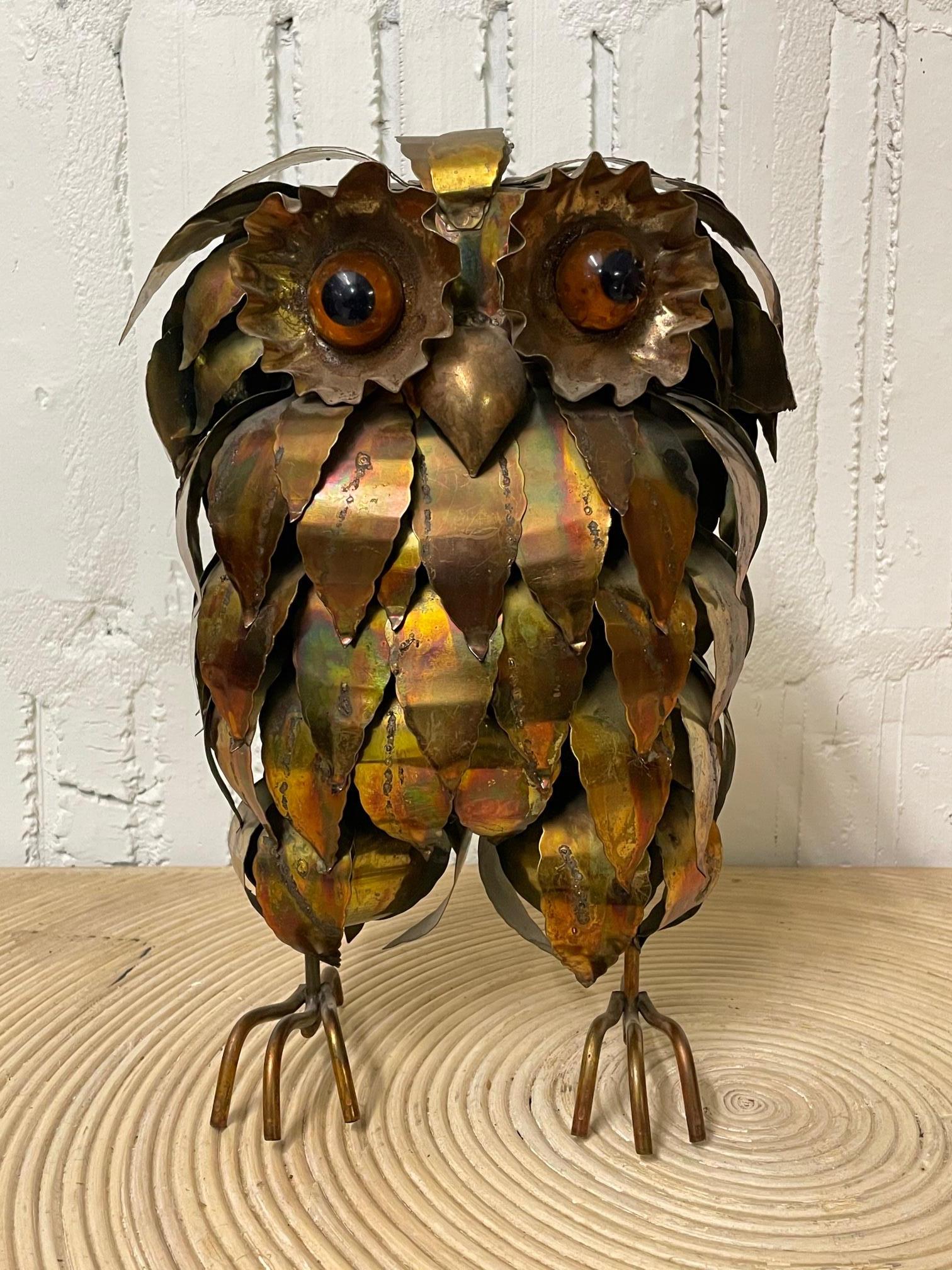 Metal torch cut owl sculpture in the manner of Curtis Jere. Features large resin eyes and a perfect patina. Very good vintage condition with only very minor imperfections consistent with age.