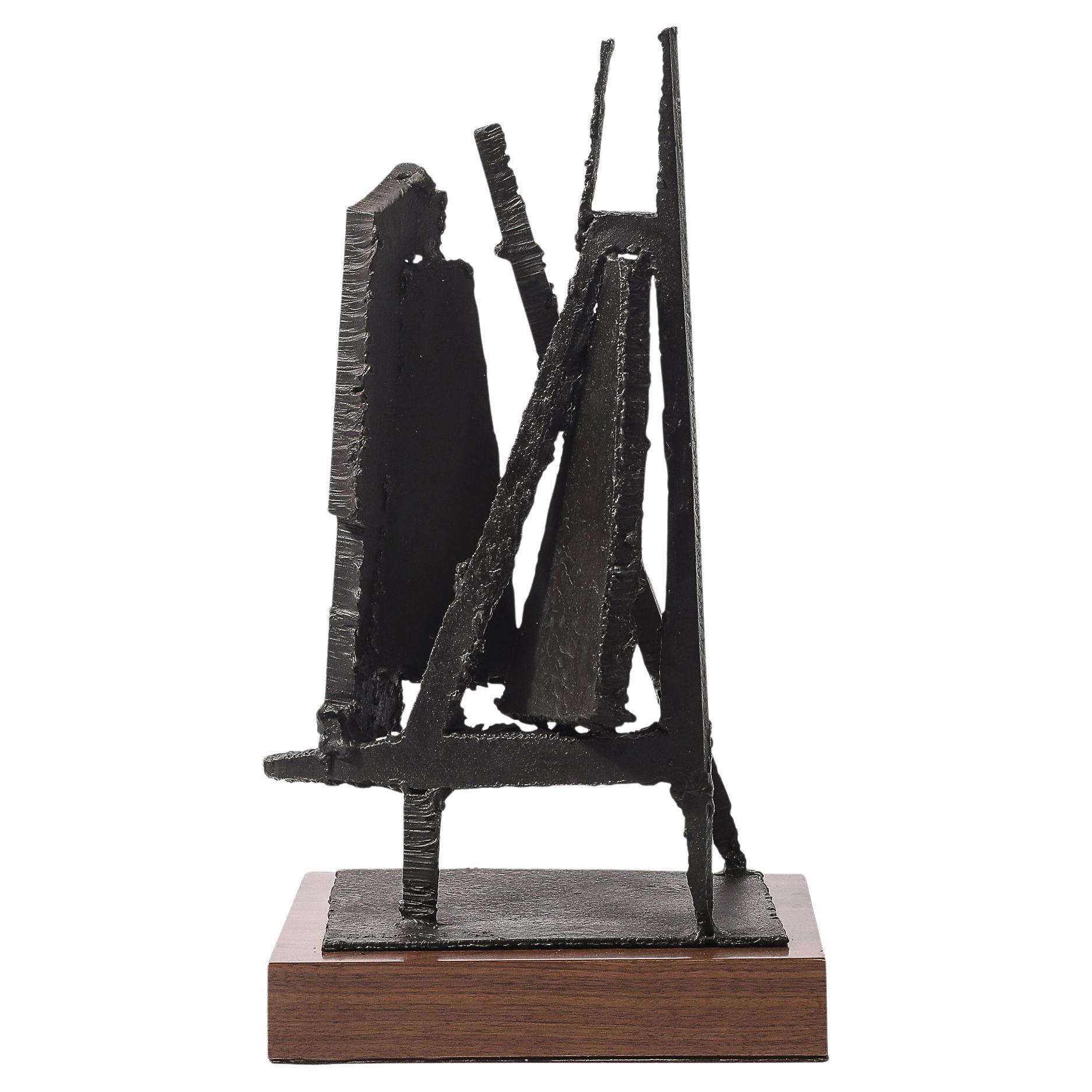 Mid-Century Torch Cut Steel Brutalist Sculpture on Walnut signée John Balossi en vente