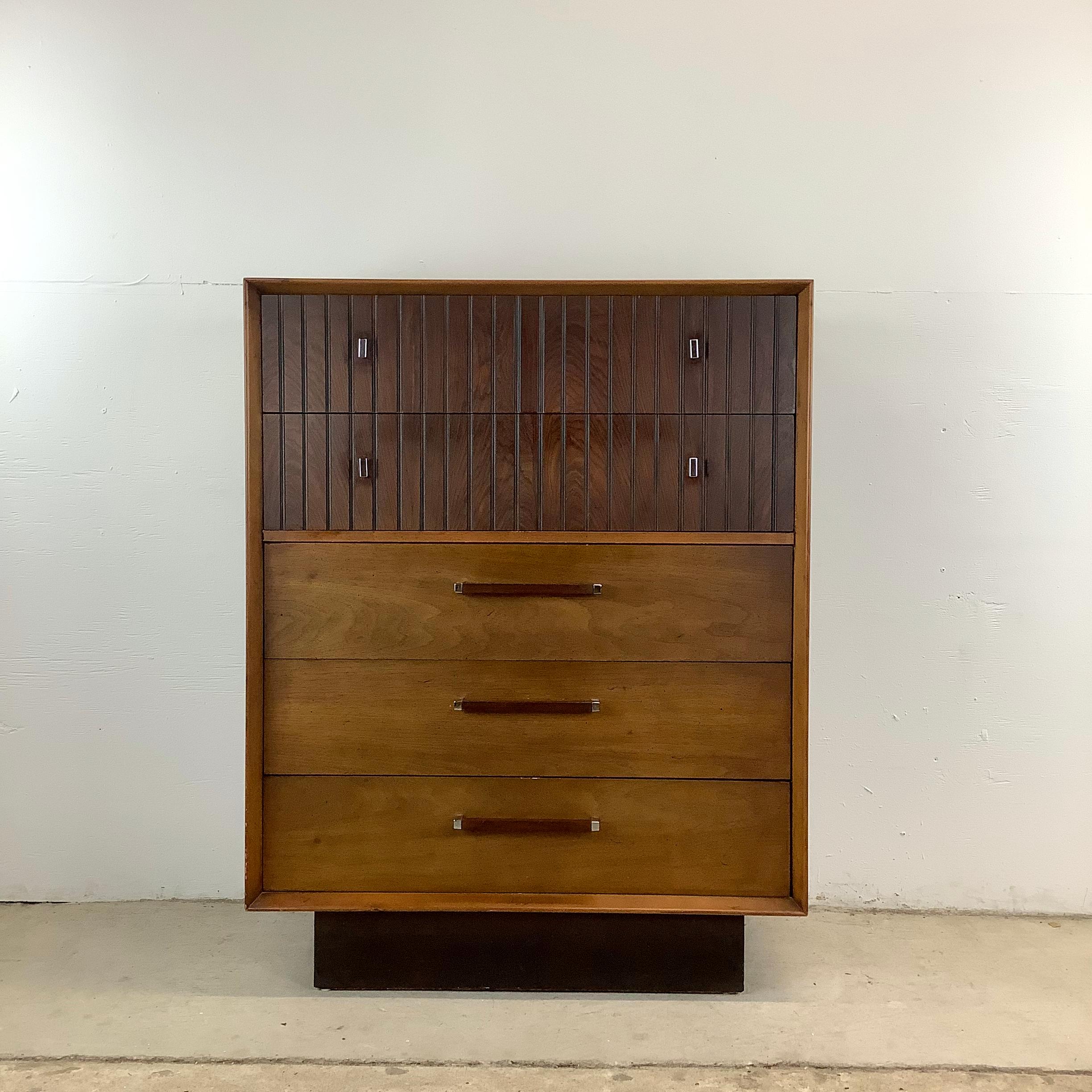 Introducing the Lane Highboy Dresser from the coveted Tower Suite Line, a stunning addition to any bedroom decor. This exquisite highboy dresser embodies mid-century modern elegance with its sleek lines, rich two-tone wood finish, and meticulous