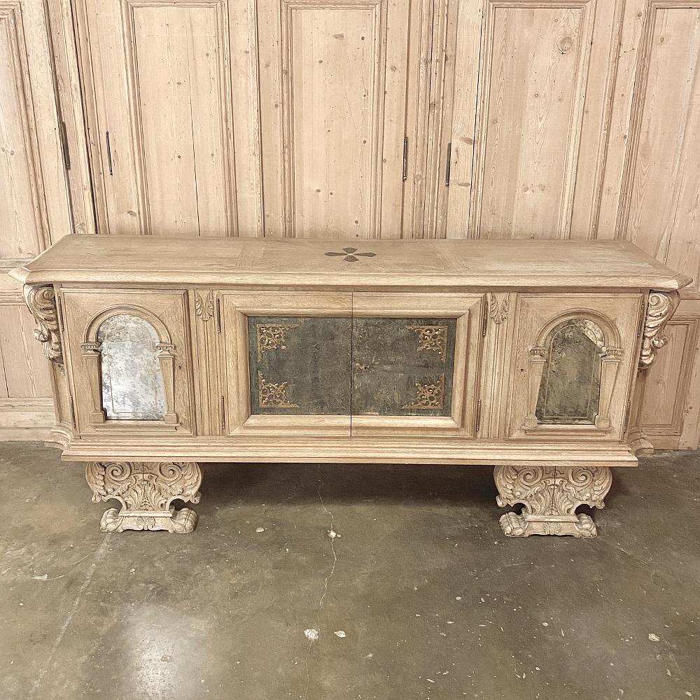 Mid-Century Transitional Raised Buffet is an impressive combination of Renaissance and Neoclassical styling! Hand-crafted from massive planks and timbers of old-growth oak, it stands on two amazingly carved supports below which raise the cabinet up