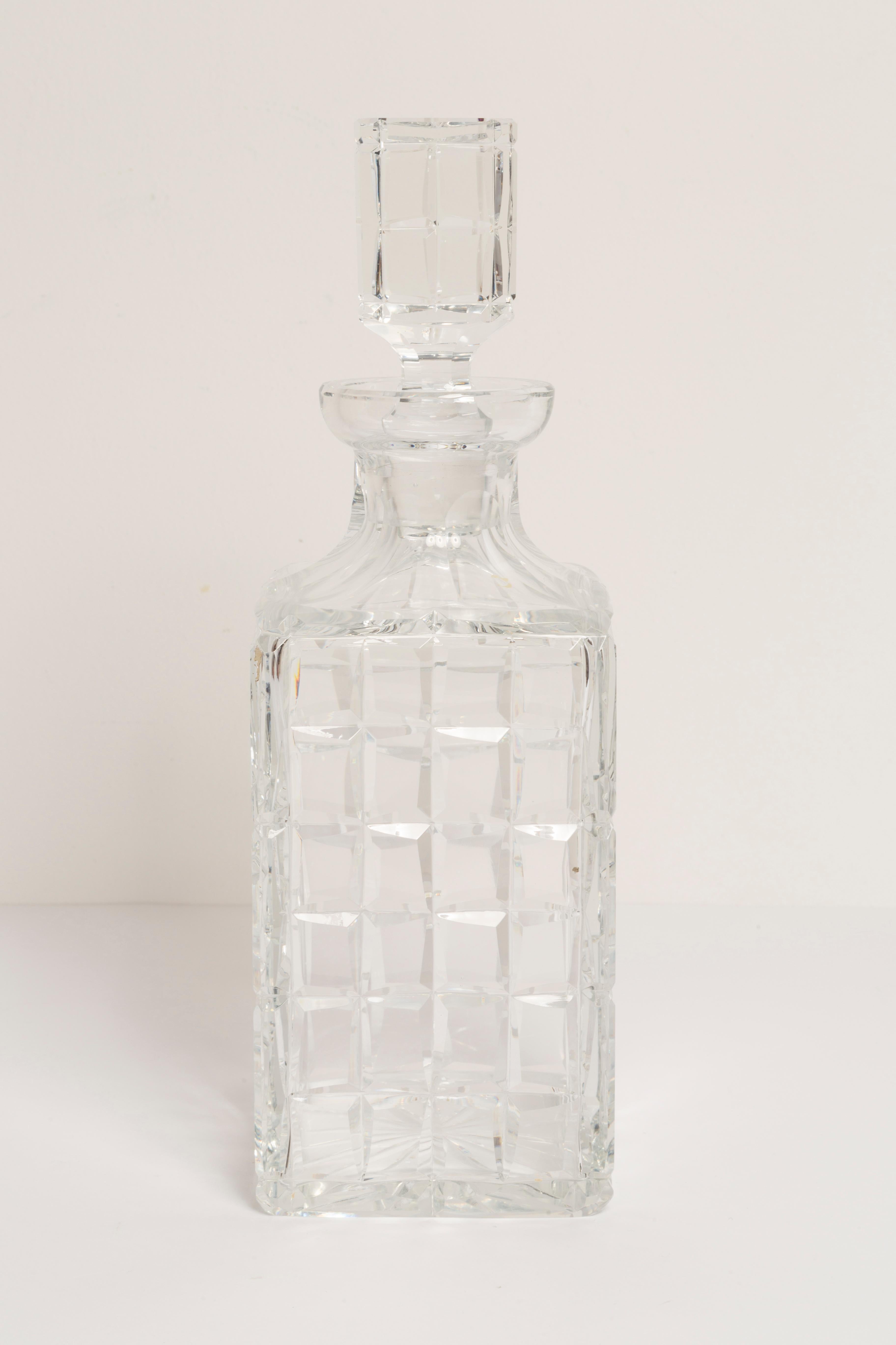 A stunning crystal transparent decanter with geometric design, made by one of the many glass manufacturers based in the region of Empoli, Italy. Would make a great addition to any collection! Very good original vintage condition. Only one unique