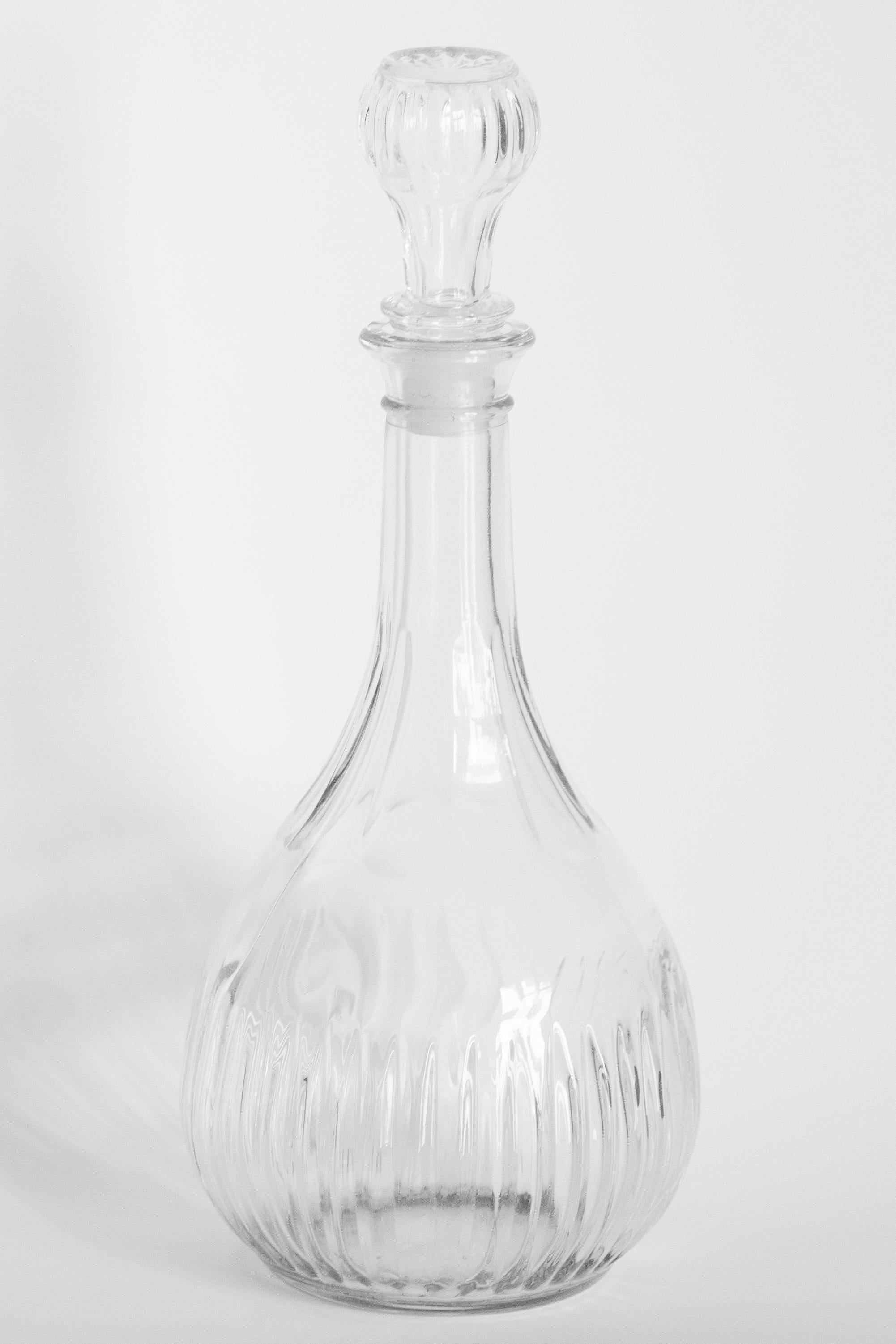 A stunning crystal transparent decanter with geometric design, made by one of the many glass manufacturers based in the region of Empoli, Italy. Would make a great addition to any collection! Very good original vintage condition. Only one unique
