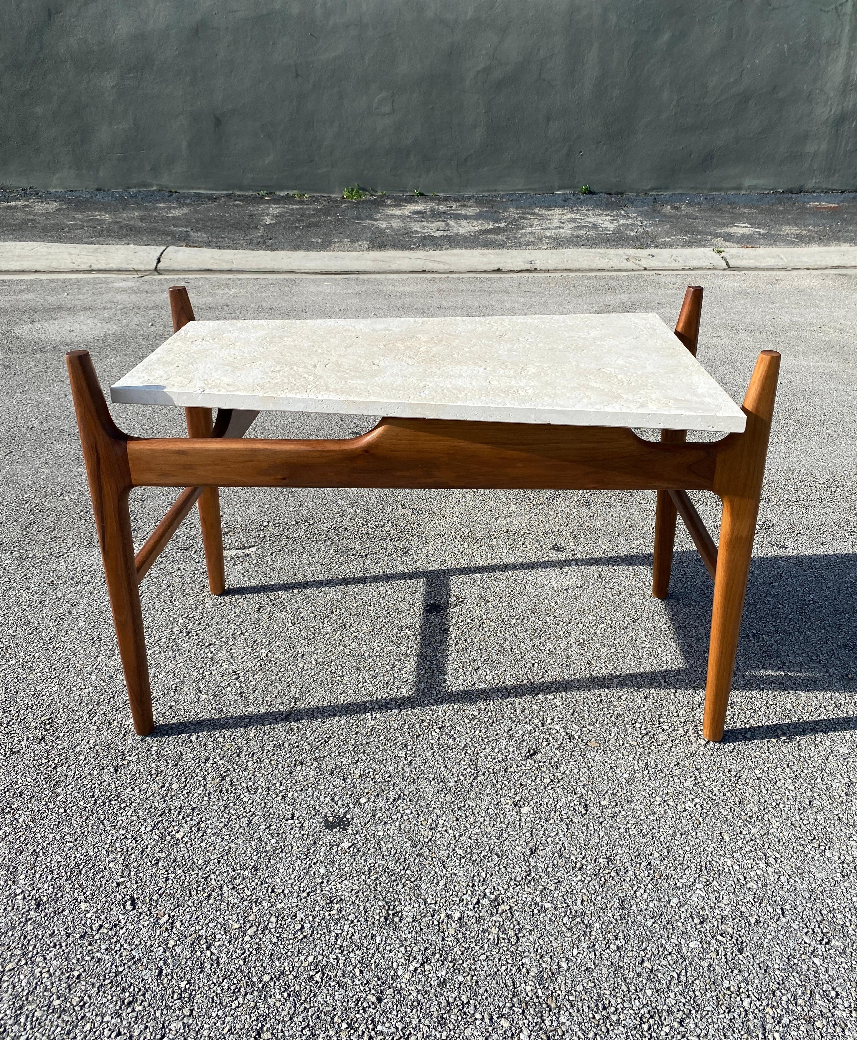 Rare vintage trapeze coral stone side table by Harvey Probber. Great combination of walnut wood and stone. Cantilever top. Circa 1960s.

33”L x 20.5”W x 21.5”H on widest side. Shortest side measures 16.5”W.

Stone surface height 19”.