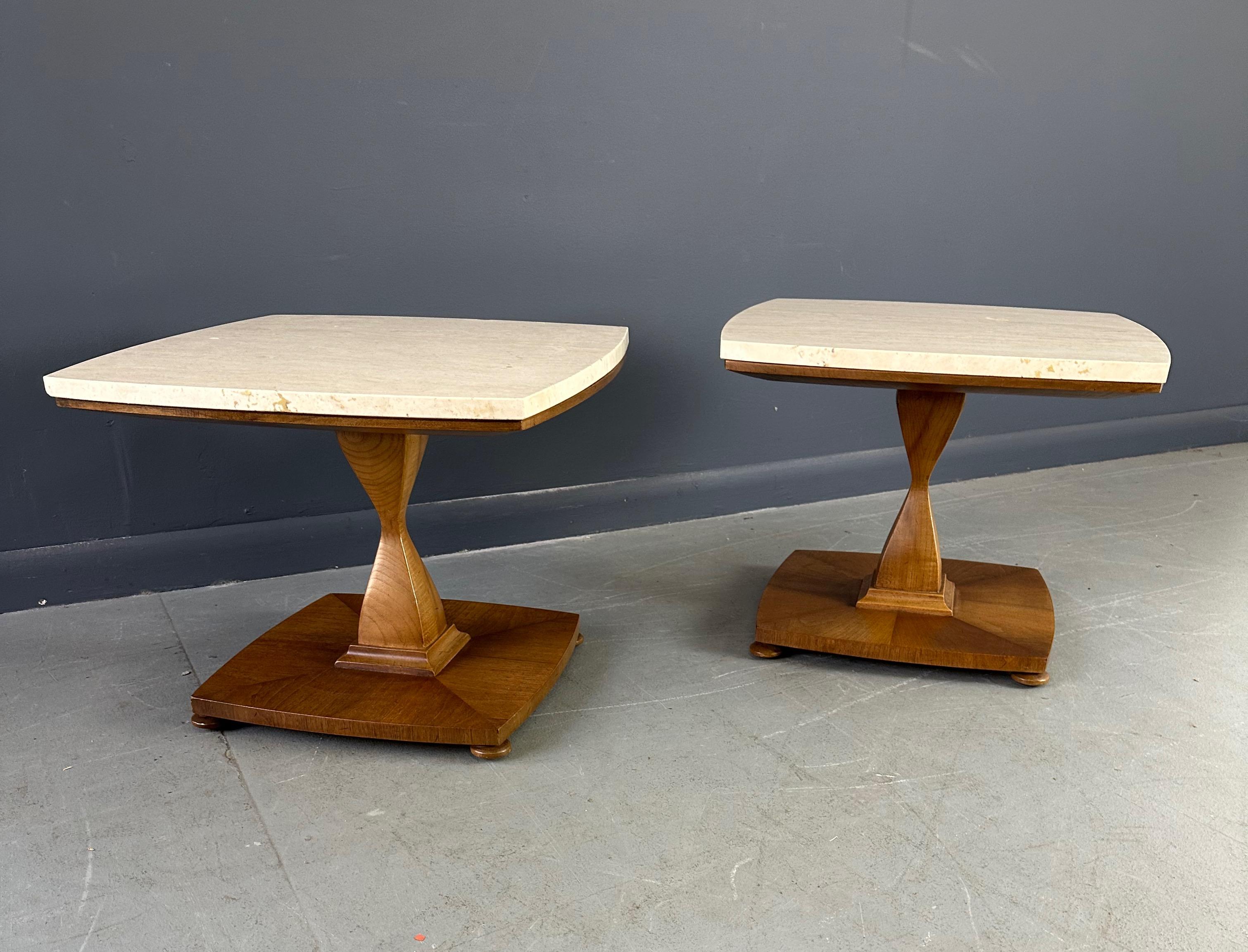Experience the modern sophistication of our Mid Century Drexel Travertine and Walnut Side Tables. With a touch of luxury and style, these tables feature a sleek combination of travertine and walnut, perfect for elevating any living space. Expertly