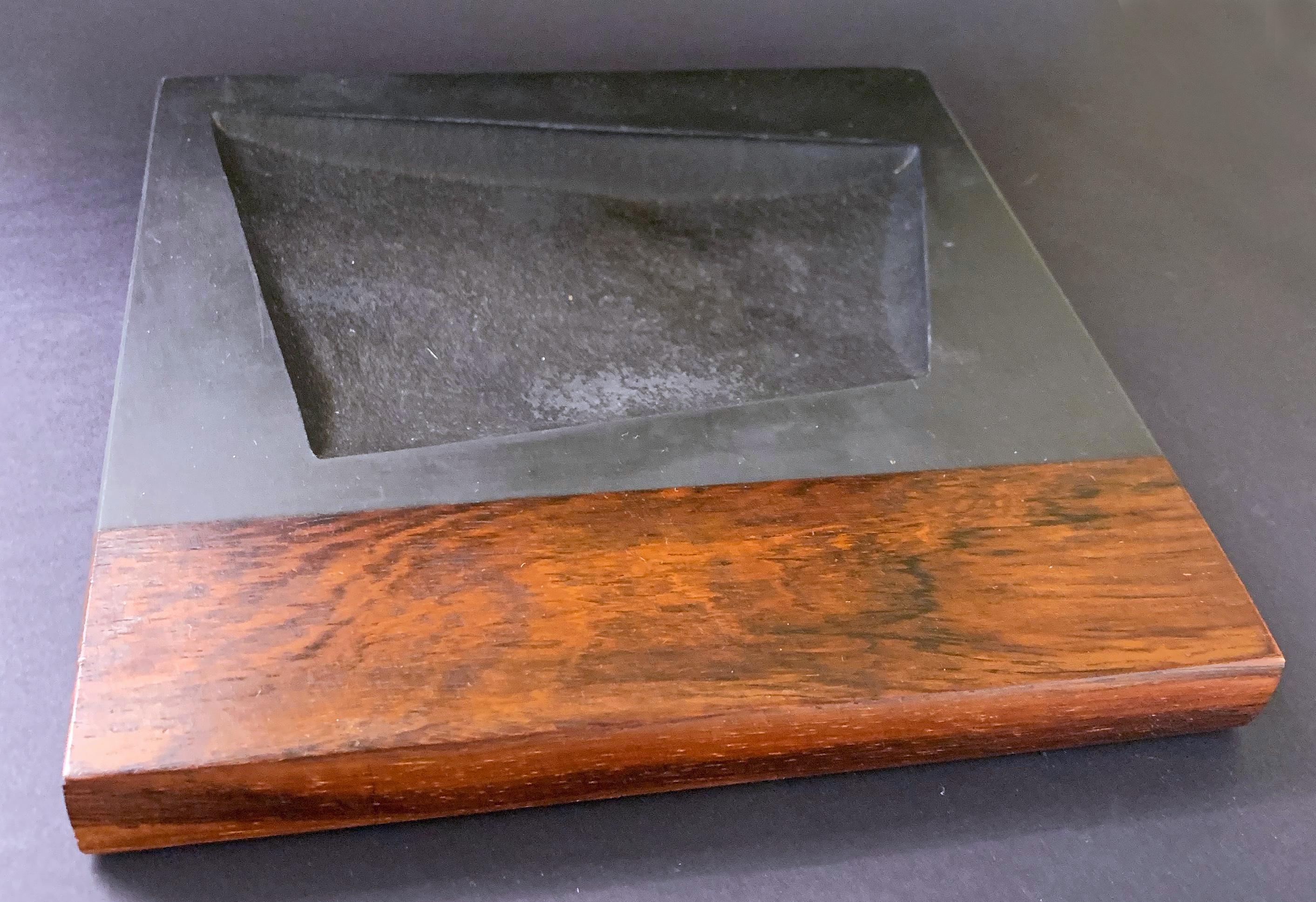 Beautifully crafted and beautifully preserved, this black slate and rosewood tray -- originally made to serve as an ashtray, but now a perfect piece to position on a desk, kitchen counter or vestibule -- was crafted by the famed Harpswell House in