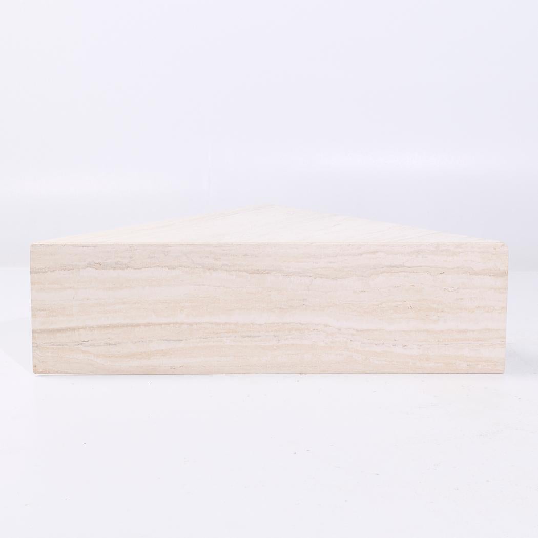 Mid Century Triangular Marble Coffee Table

This coffee table measures: 55.75 wide x 27.75 deep x 15.75 inches high

We take our photos in a controlled lighting studio to show as much detail as possible. We do not Photoshop out