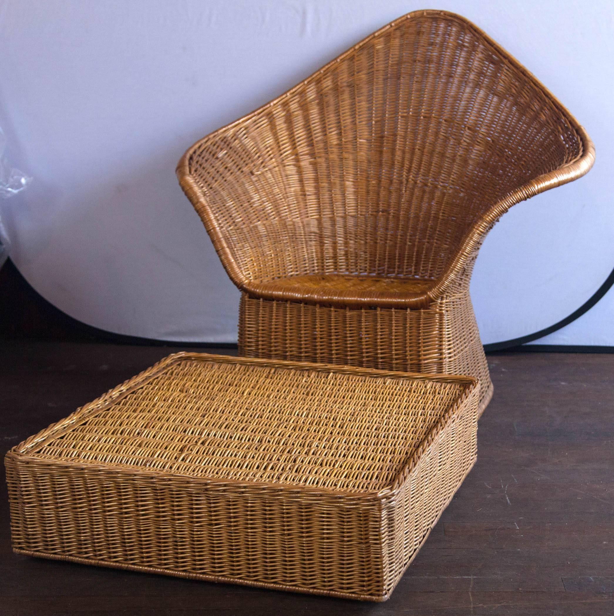 High drama! Unusual modern wicker armchair with large ottoman. Comfortable!
Ottoman is 31 inches square, 9 inches high.