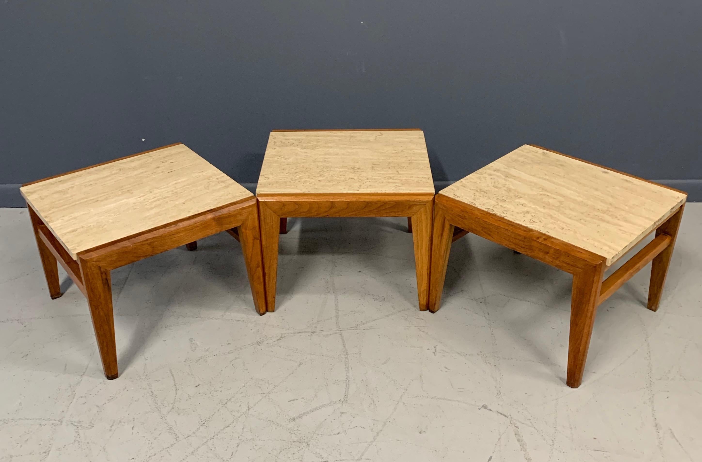 These versatile stools with nicely figured walnut and travertine tops can be used separately or you can push them together to form a bench using either two or three.