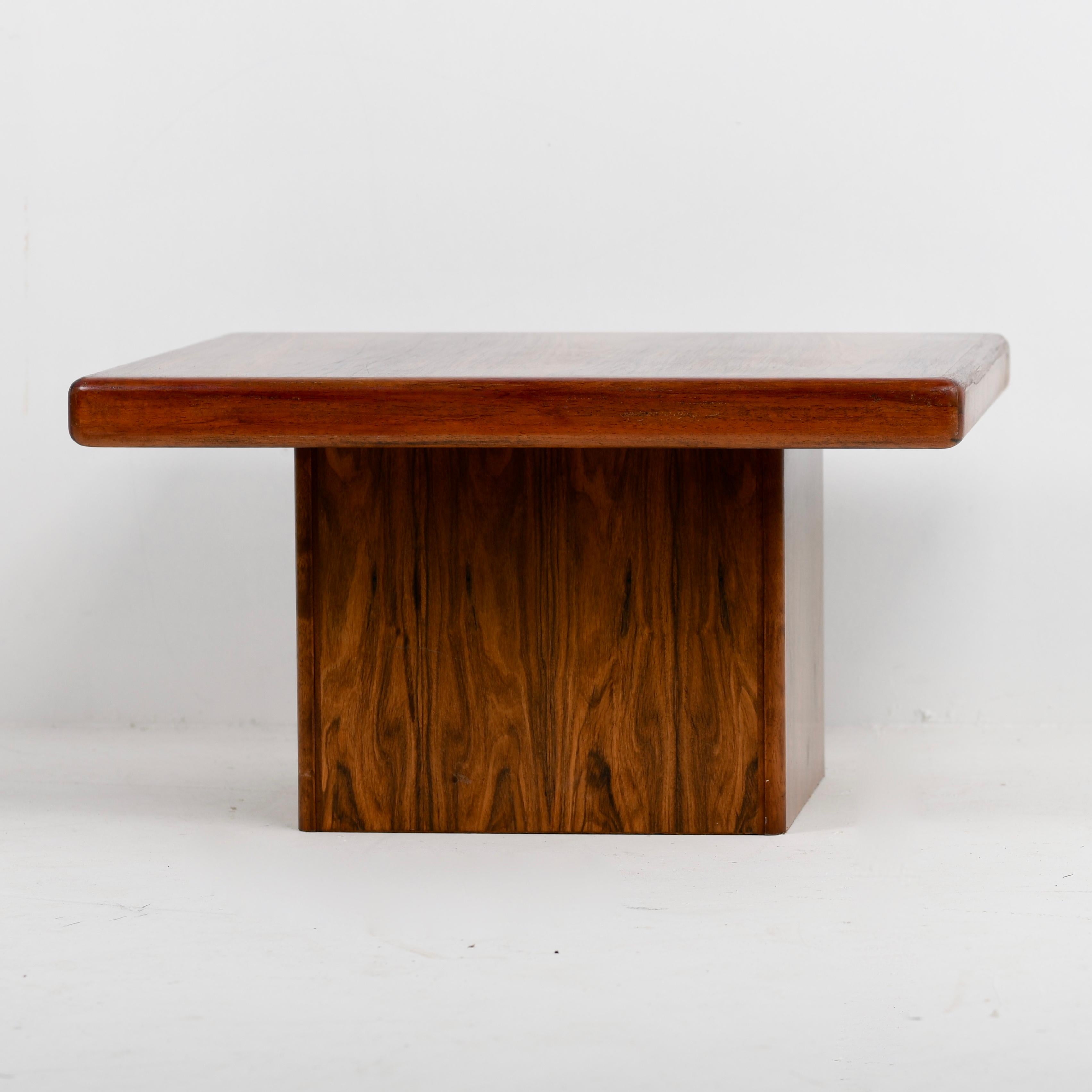 This square rosewood coffee table was manufactured in Denmark by Trioh very good graining to the rosewood veneer.