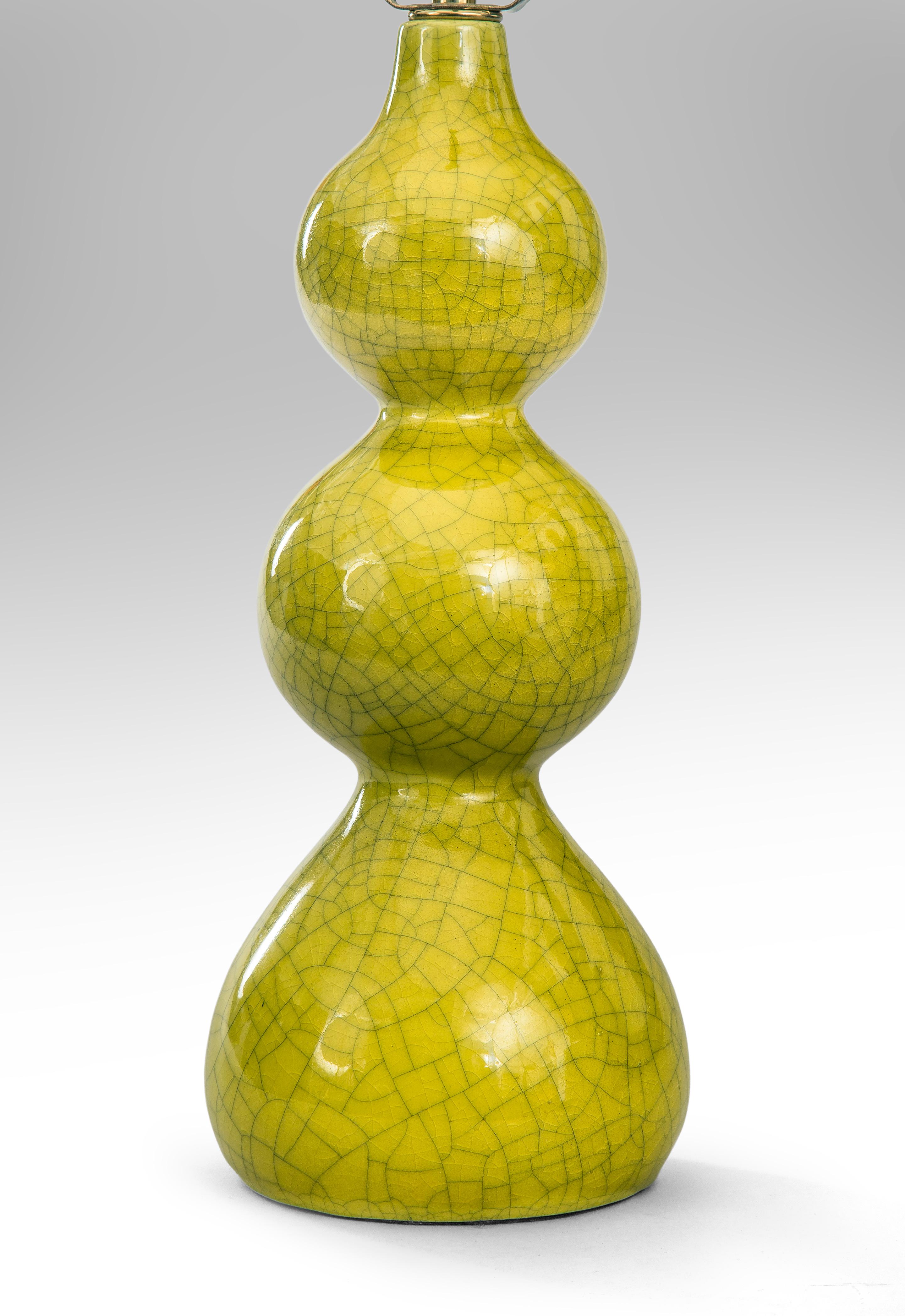 Midcentury Triple Gourd Lamp
Mid-20th century
Classic triple gourd shapes are one of the most enduring of all ceramic forms going well with the most modern or traditional interior. The richly colored chartreuse glaze enhanced by a distinctive