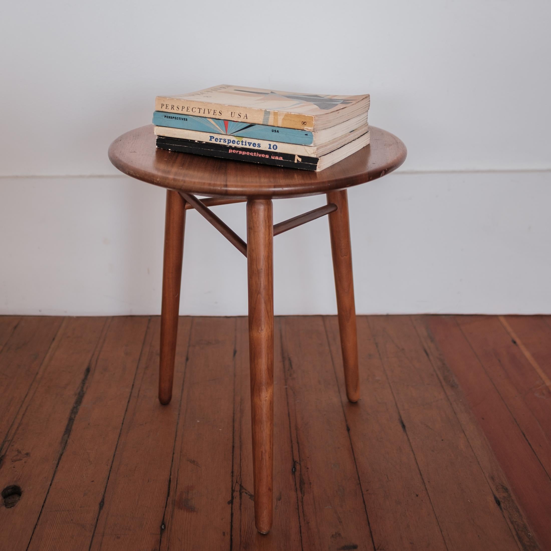 California design three leg stool or side table by Kipp Stewart and Stewart MacDougall for Glenn of California. Slightly concave tops. Great architectural structure in solid walnut, 1950s.