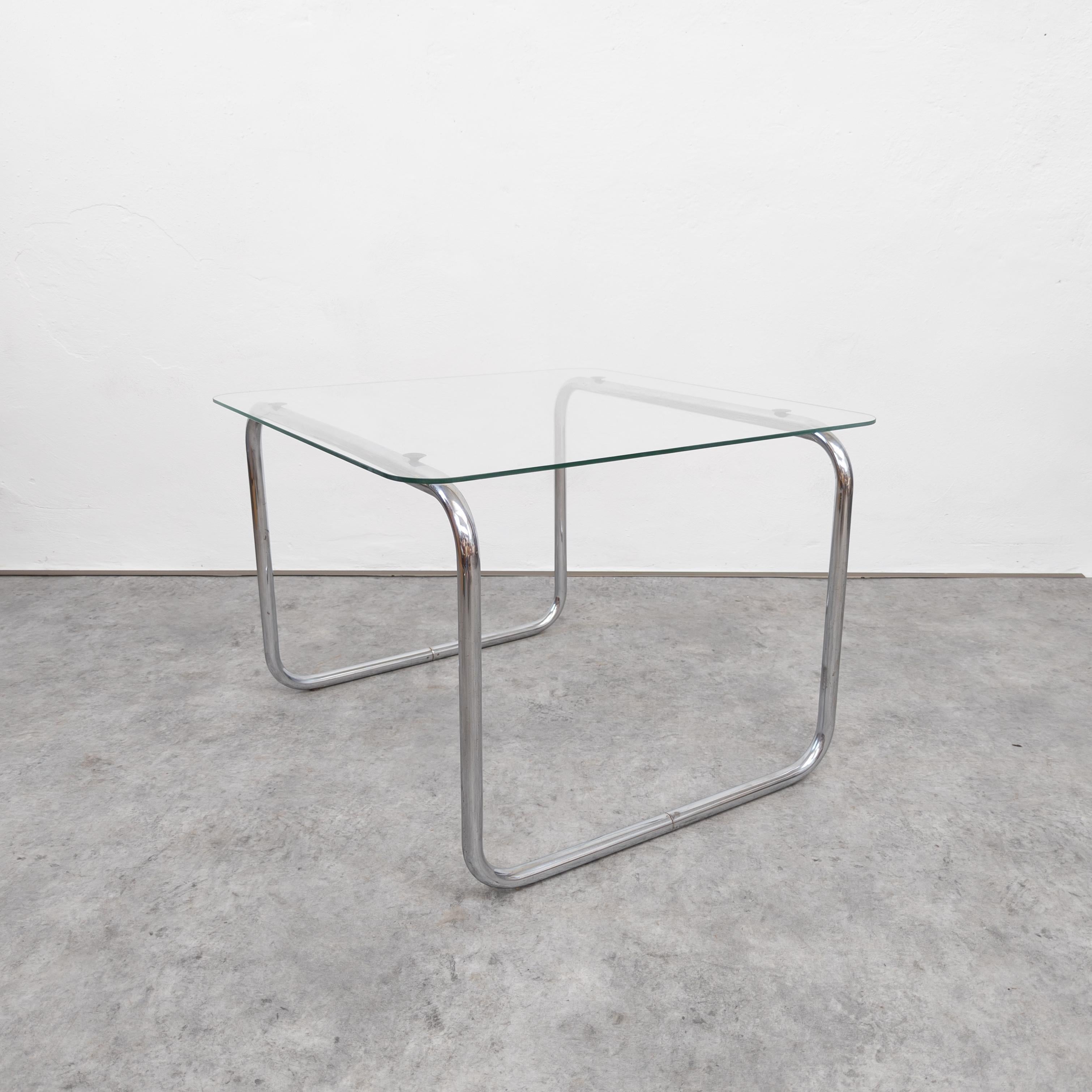 Based on the design by Marcel Breuer, manufactured by Kovona, former Slezák company in Czechoslovakia early 1950's. Chrome plated steel tubes in very good original condition with only minor scratches. Glass top without any chips. Measures: height 50