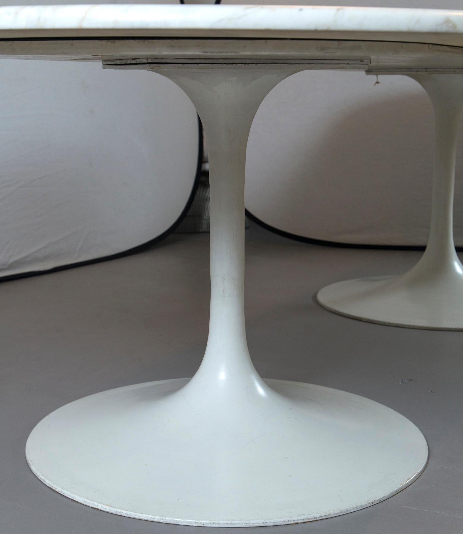 Mid-Century Modern Tulip dining table bases attributed to Eero Saarinen with custom marble top.