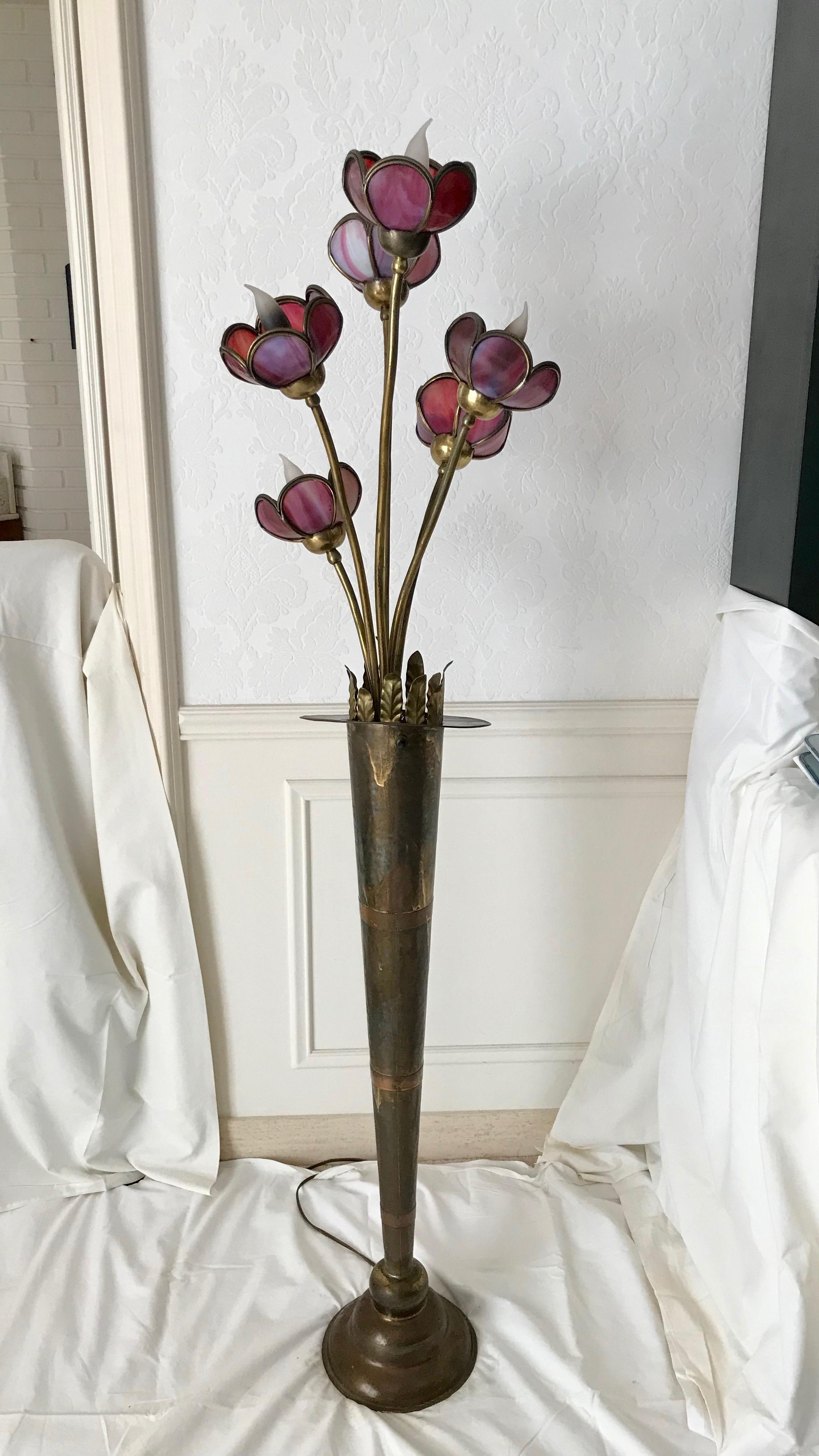 Fancifully designed with thin hammered sheet brass or metal.
Floor vase from which 5 variated 