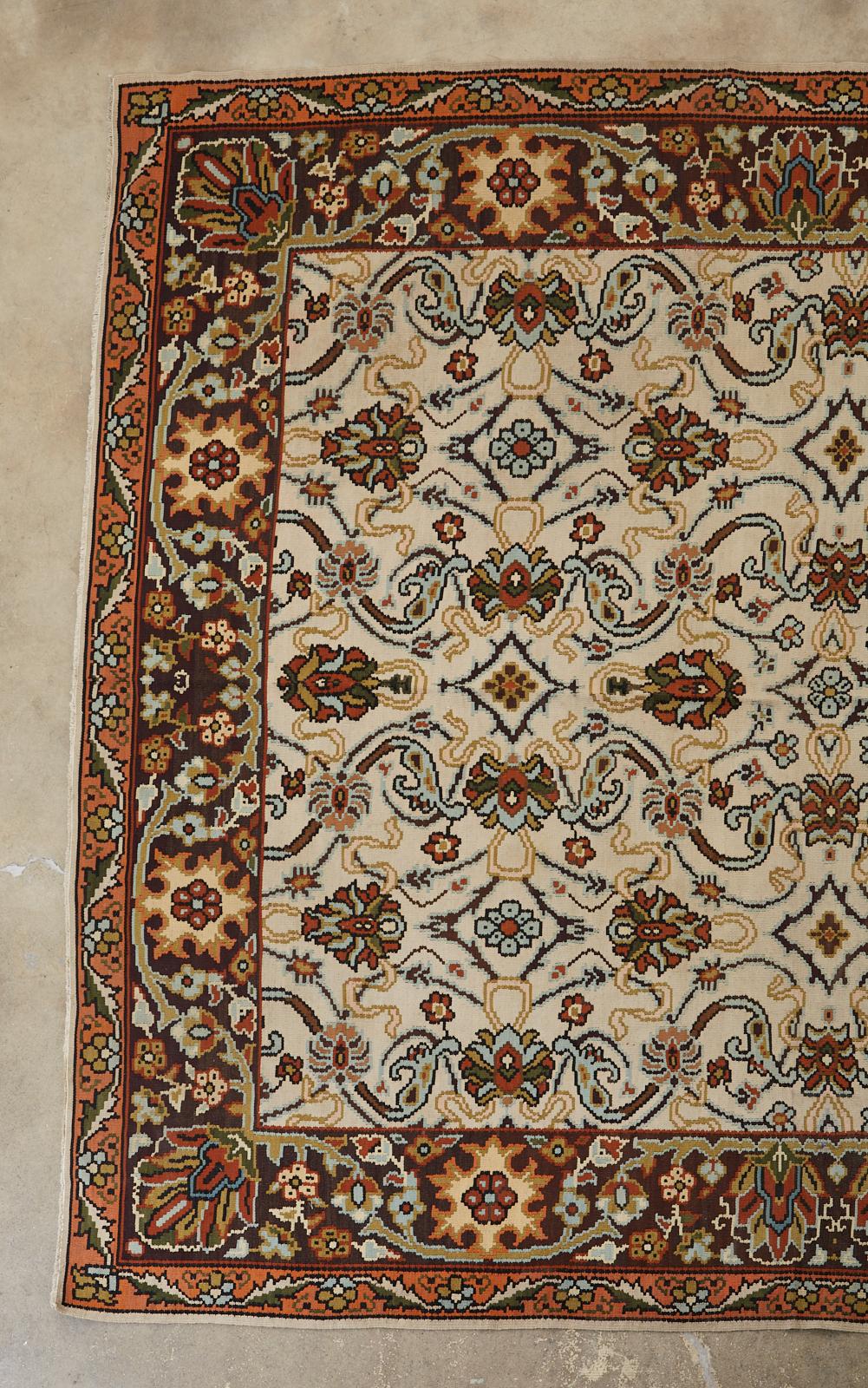 Large Mid-Century Modern Turkish flat-weave Thracian Kilim featuring an arts and crafts style floral decoration. The richly colored stylized flowers stand out prominent by against the khaki field. Beautifully woven with pale blue and green accents.