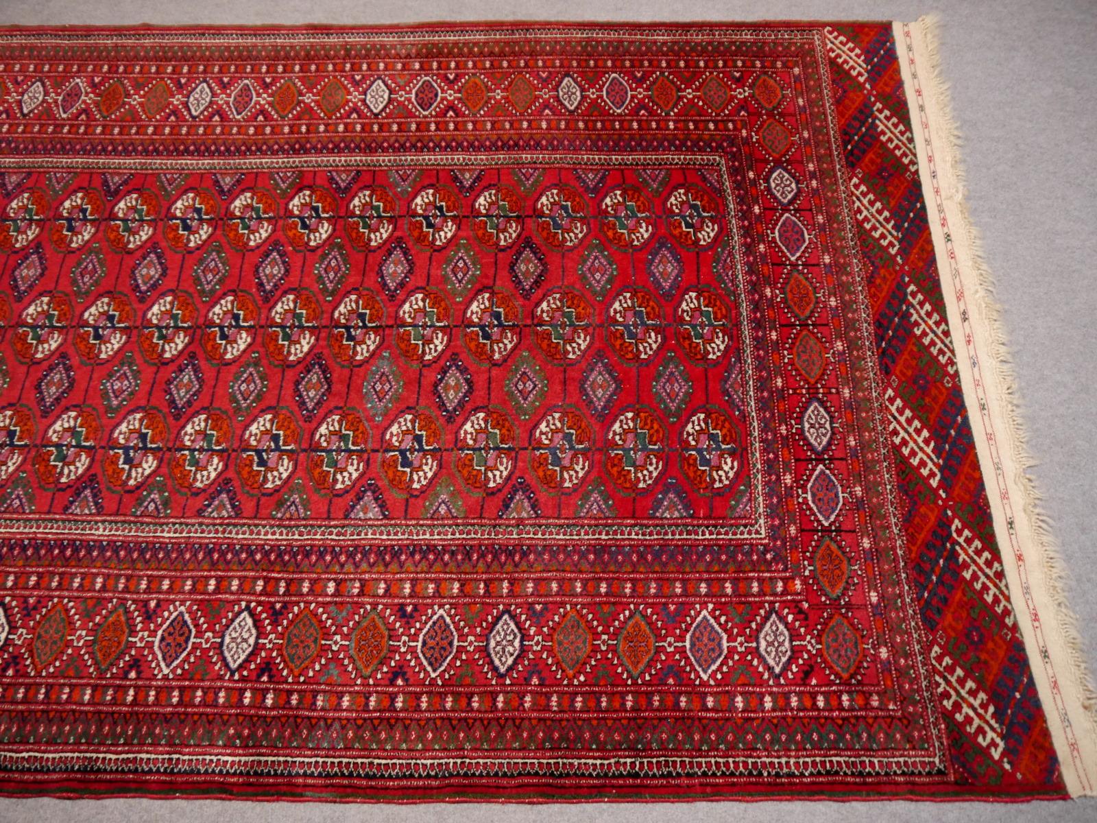 Fine hand knotted Russian Turkmen Bokhara rug or Turkmen rug Midcentury

Beautiful antique tribal Turkmen carpet in great condition. These carpets are named 