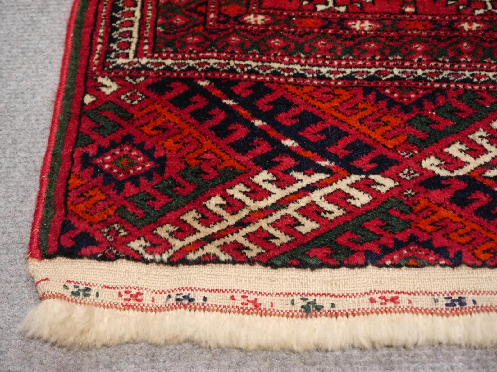 Hand-Knotted Midcentury Turkman Bokhara Tekke Tribal Persian Rug hand knotted in Turkmenistan