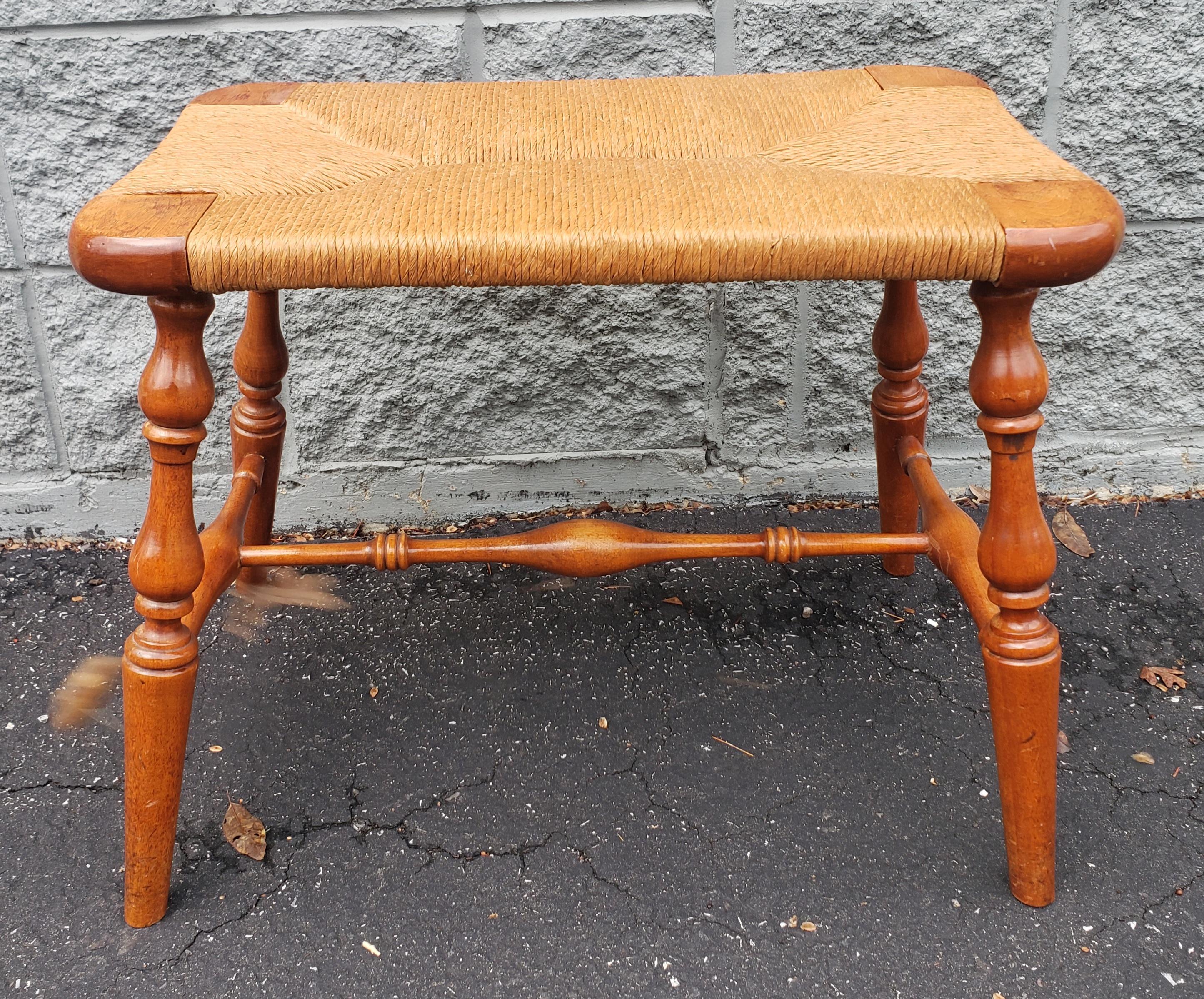 Very well maintained midcentury Turned Maple and Seat Seat Bench in very good vintage condition.