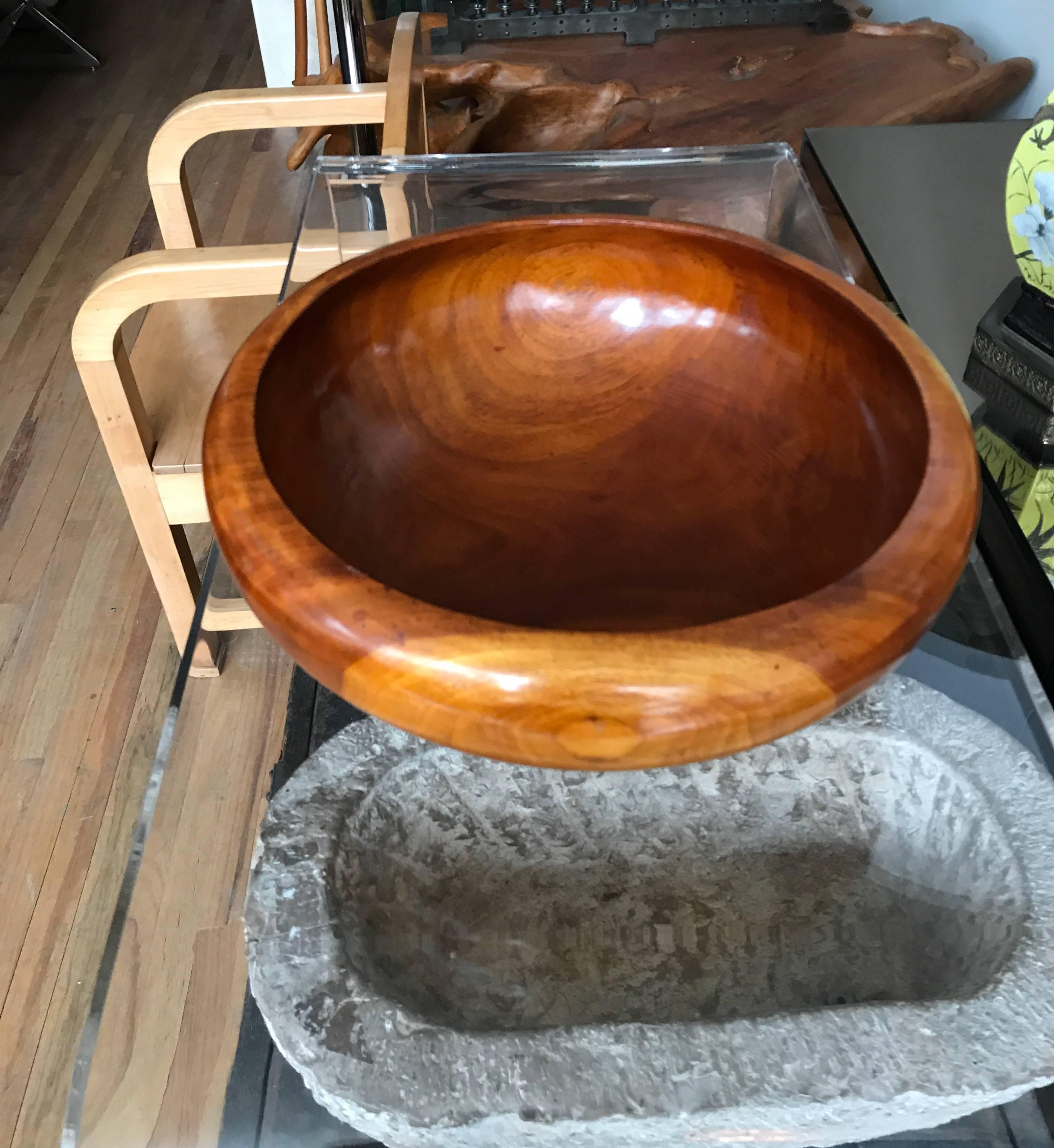 An exotic wood turned wood centrepiece bowl.