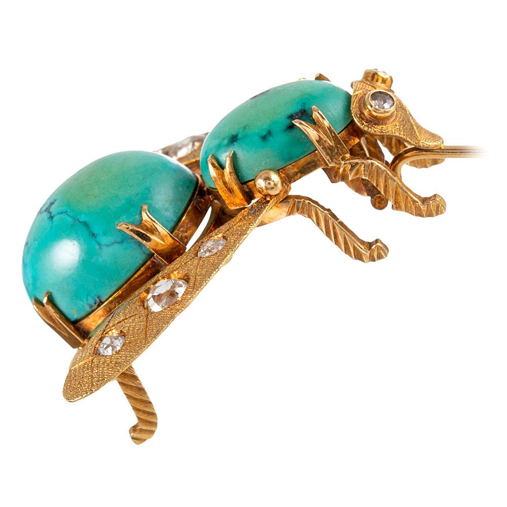 These larger-than-expected bees framed in 18 karat yellow gold and decorated with antique cut diamonds on the textured wings will make a charming addition to your lapel. Their bodies are set with cabochons of turquoise, adding a lovely organic