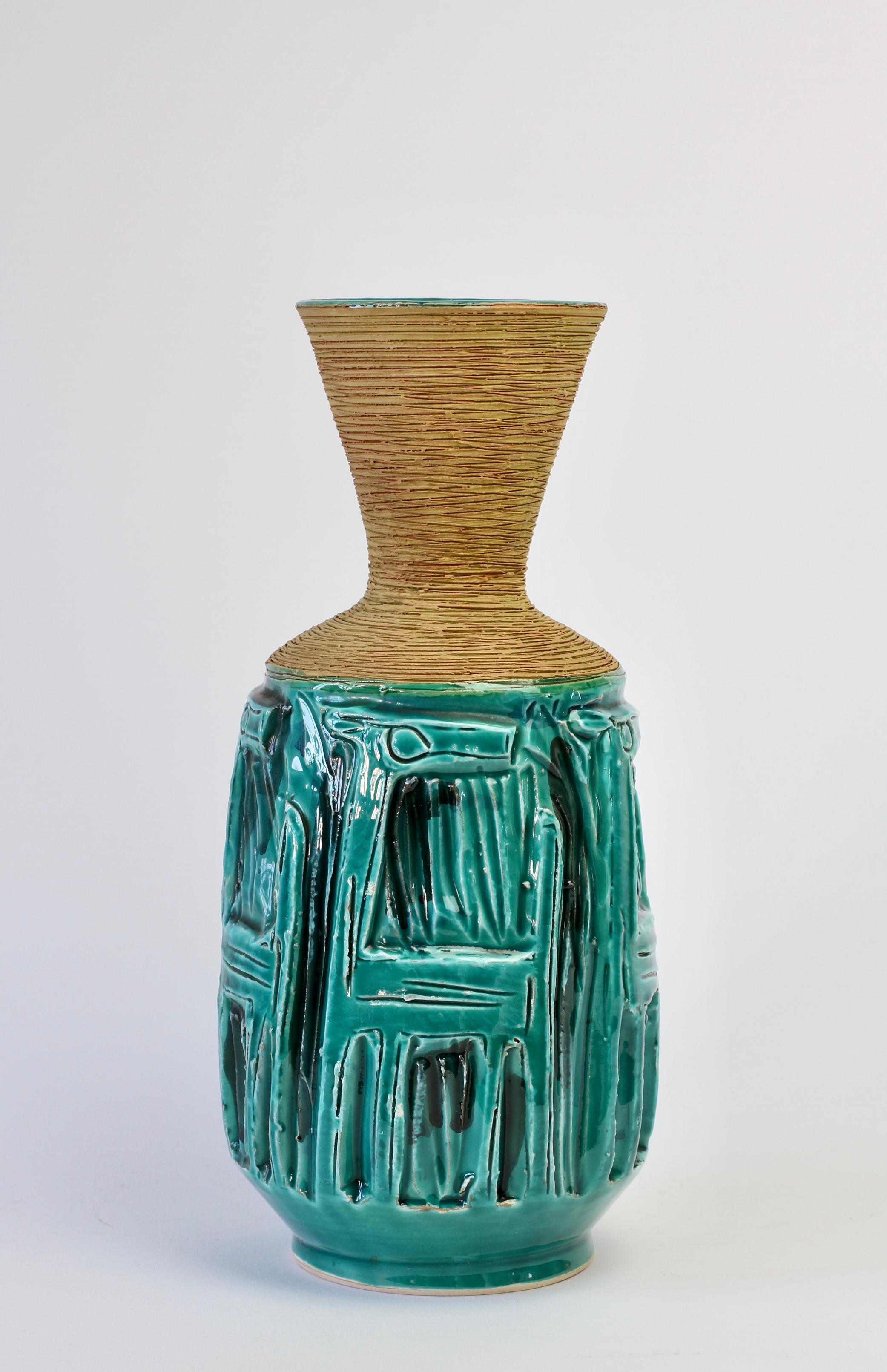 Beautifully detailed vase in vibrant turquoise (green / blue) with textured sgraffito shoulder and neck by Fratelli Fanciullacci, Italy, circa 1960s. Wonderful whimsical embossed animal pattern, possibly a dog. Lovely shading and texture to this