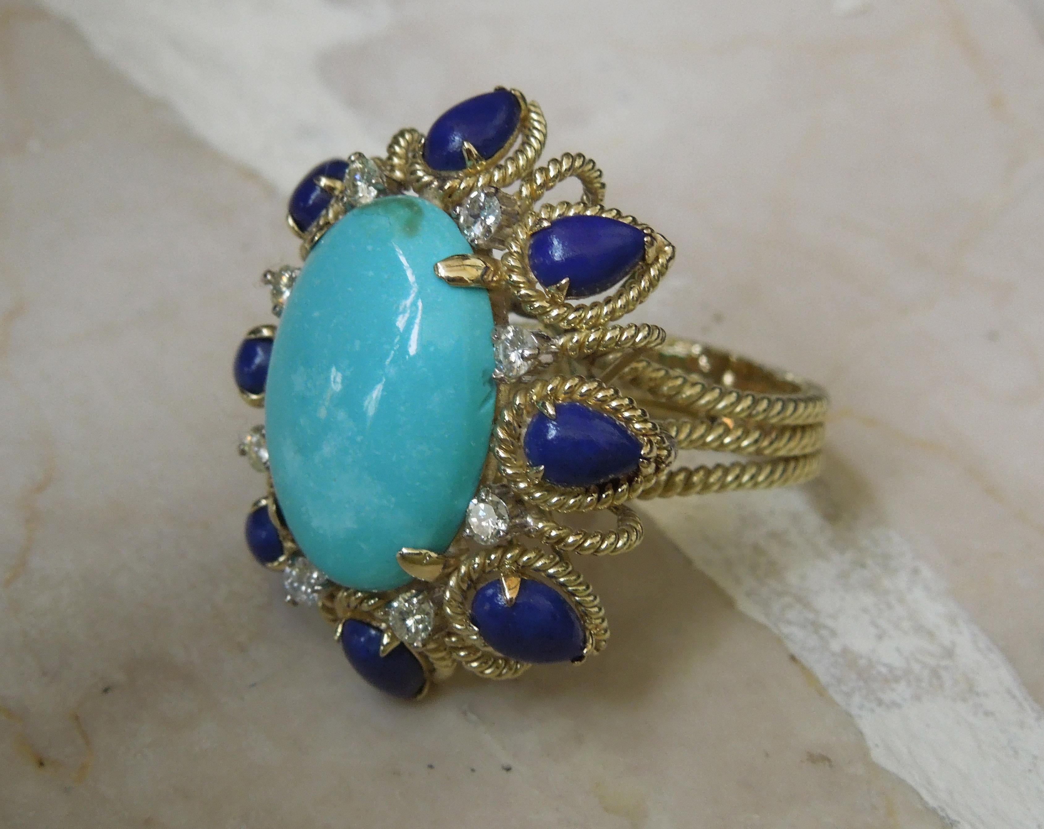 Featuring 1 Central Oval piece of Natural Turquoise at approximately 20mm x 13.3mm, secured in 4 Prongs. Surrounded by 8 Pear shaped pieces of Natural Lapis Lazuli, spaced with 8 Colorless Nearly Flawless to Slightly Included Round Brilliant cut